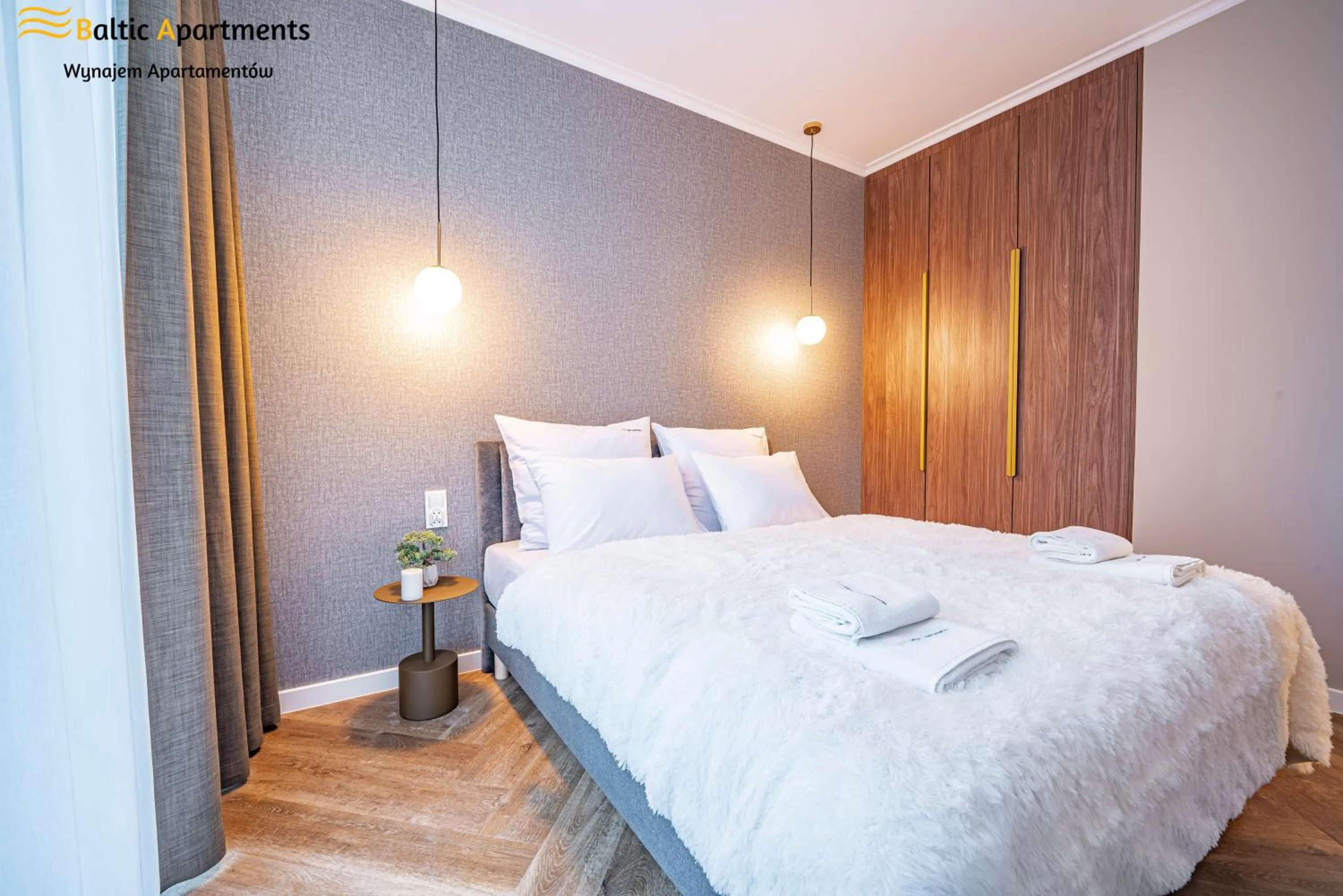 Bed in Seaside Garden Apartments & Wellness by Baltic Apartments