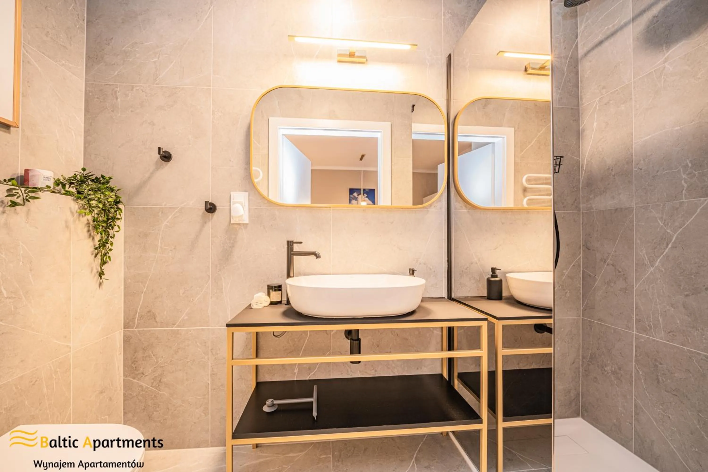 Shower in Seaside Garden Apartments & Wellness by Baltic Apartments