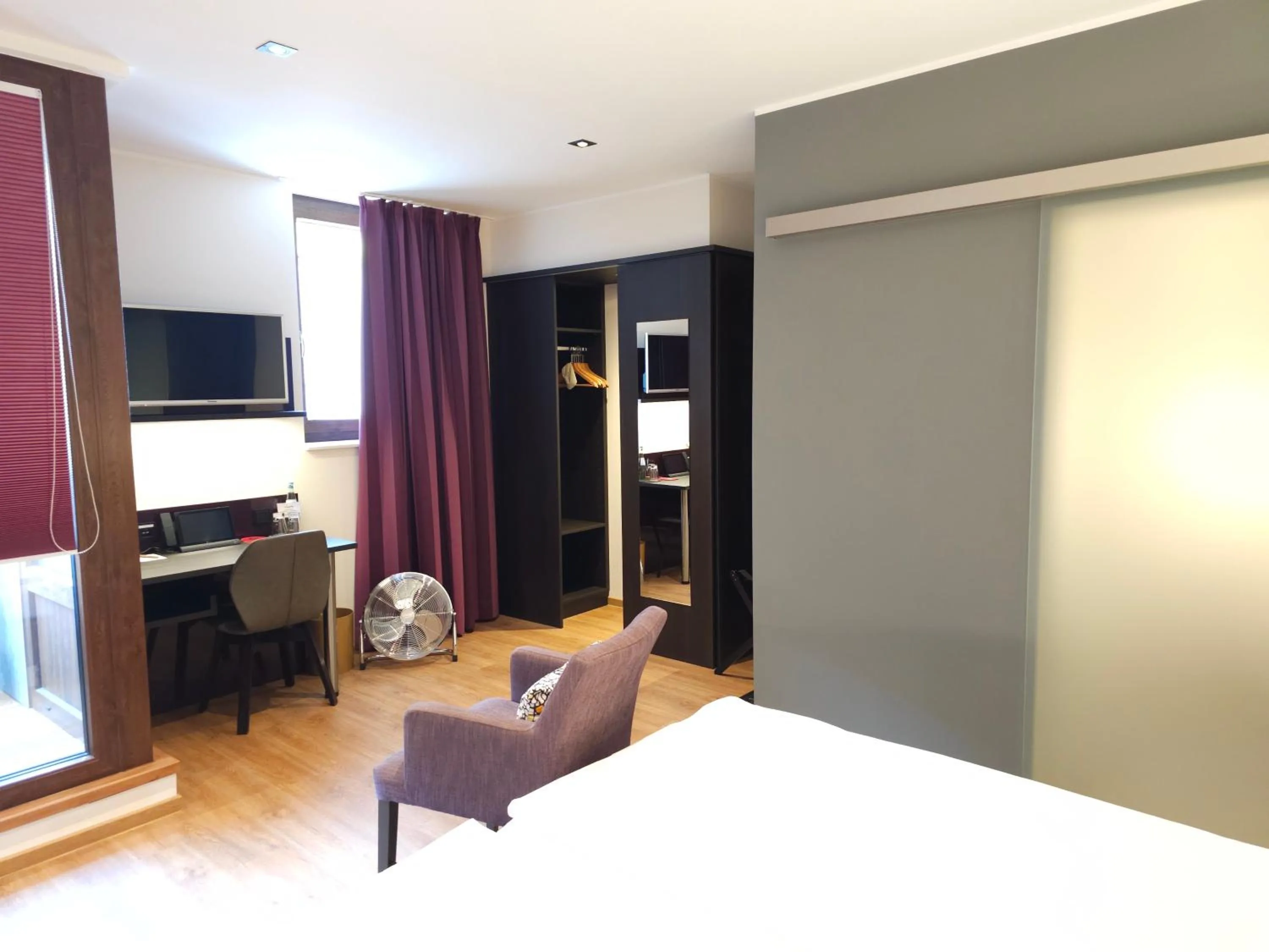 Photo of the whole room, Bed in Weinhotel Restaurant Klostermühle