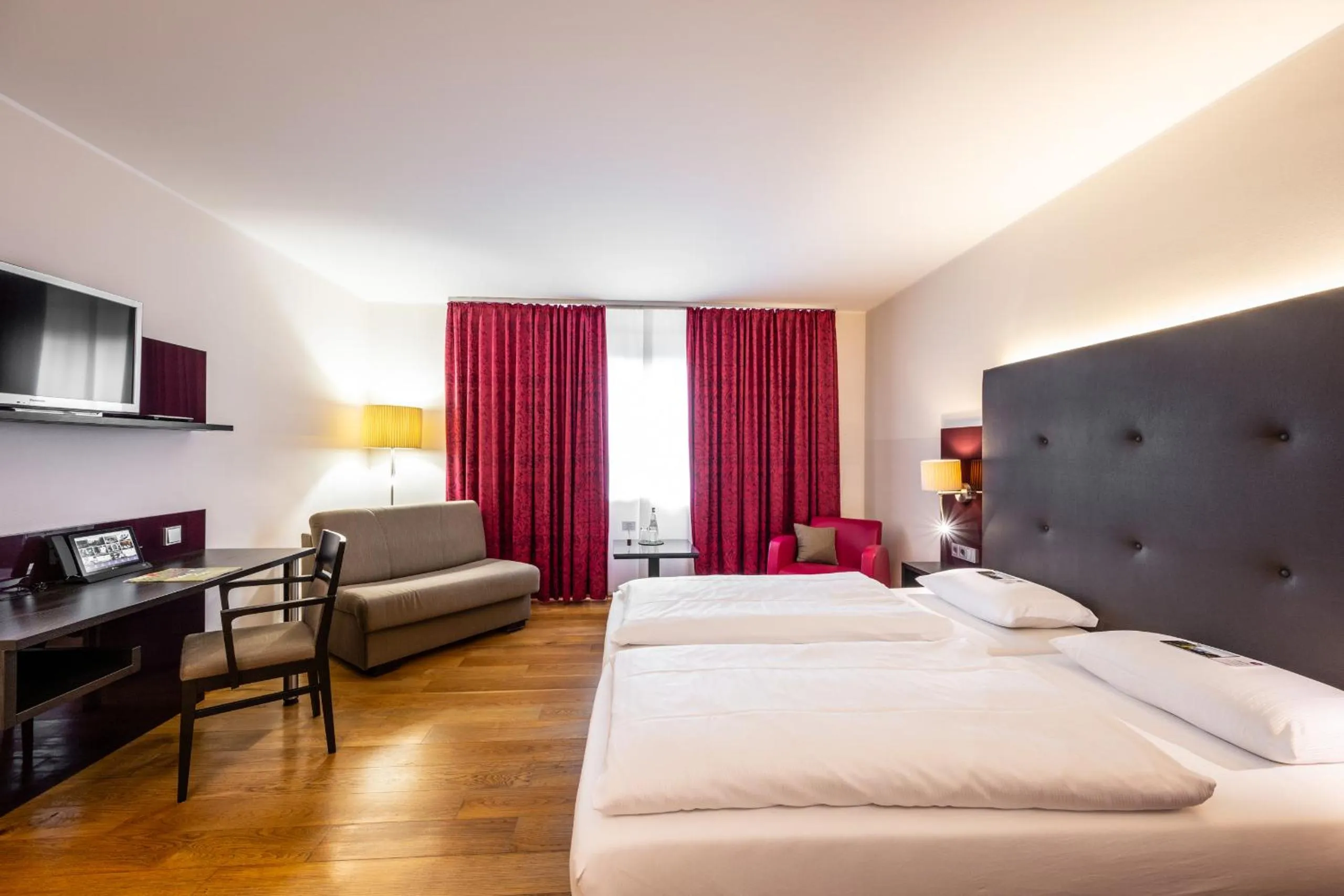 Photo of the whole room, Bed in Weinhotel Restaurant Klostermühle