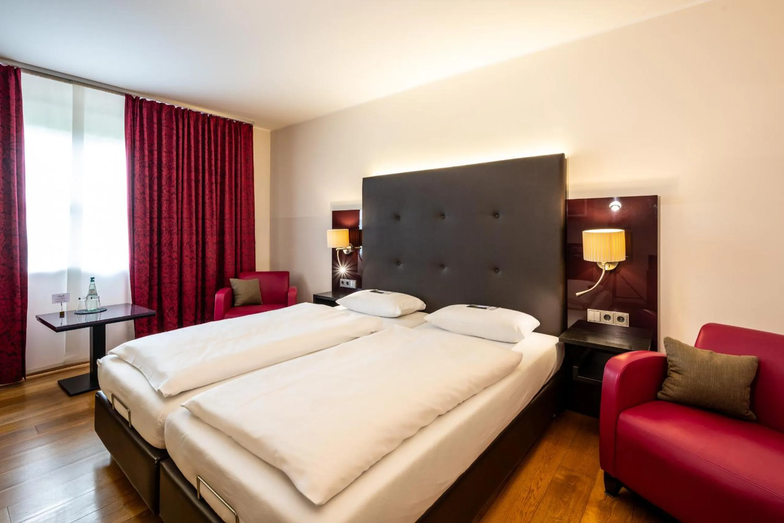 Photo of the whole room, Bed in Weinhotel Restaurant Klostermühle