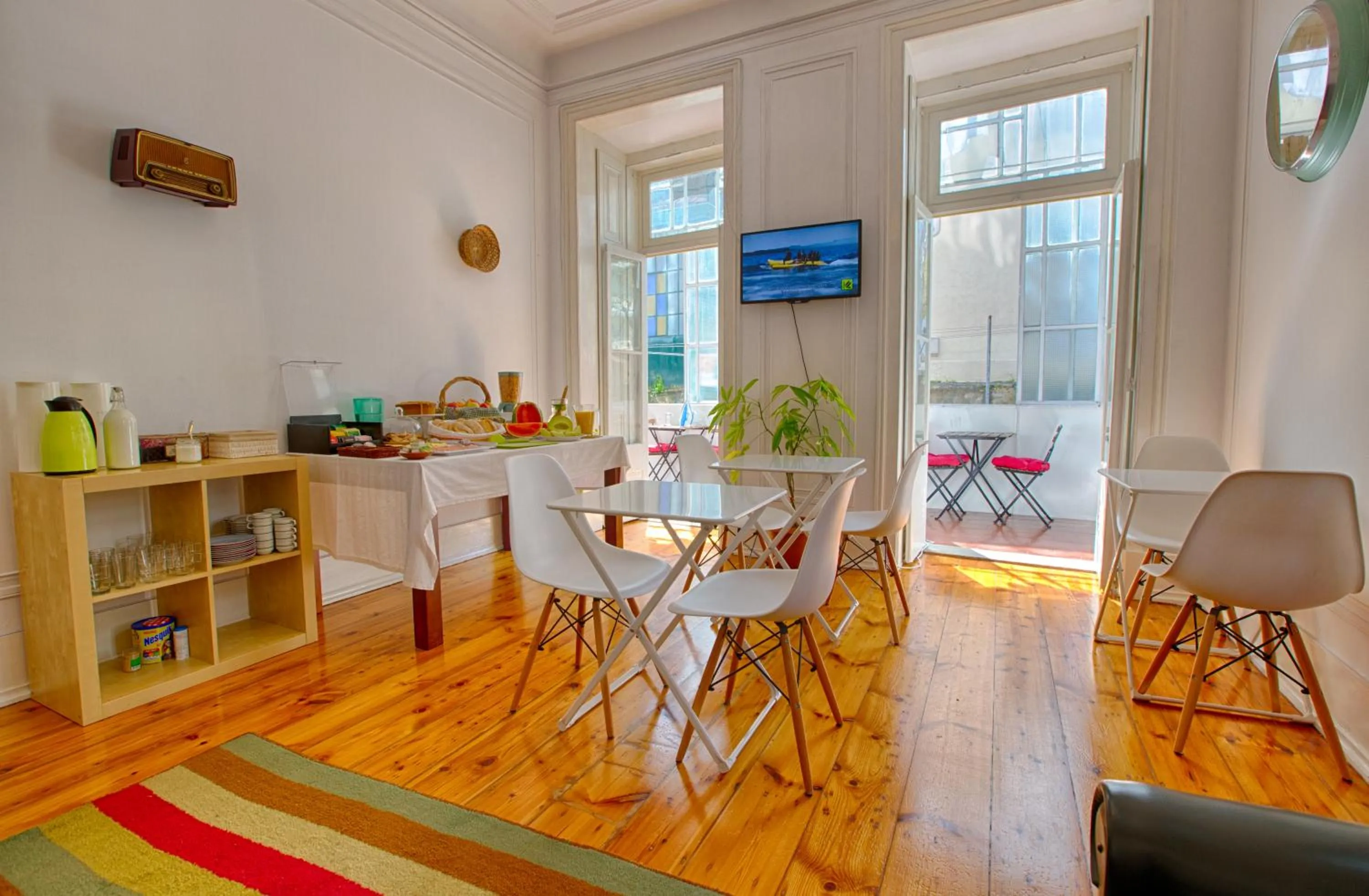 Communal lounge/ TV room in Chalet D´Ávila Guest House