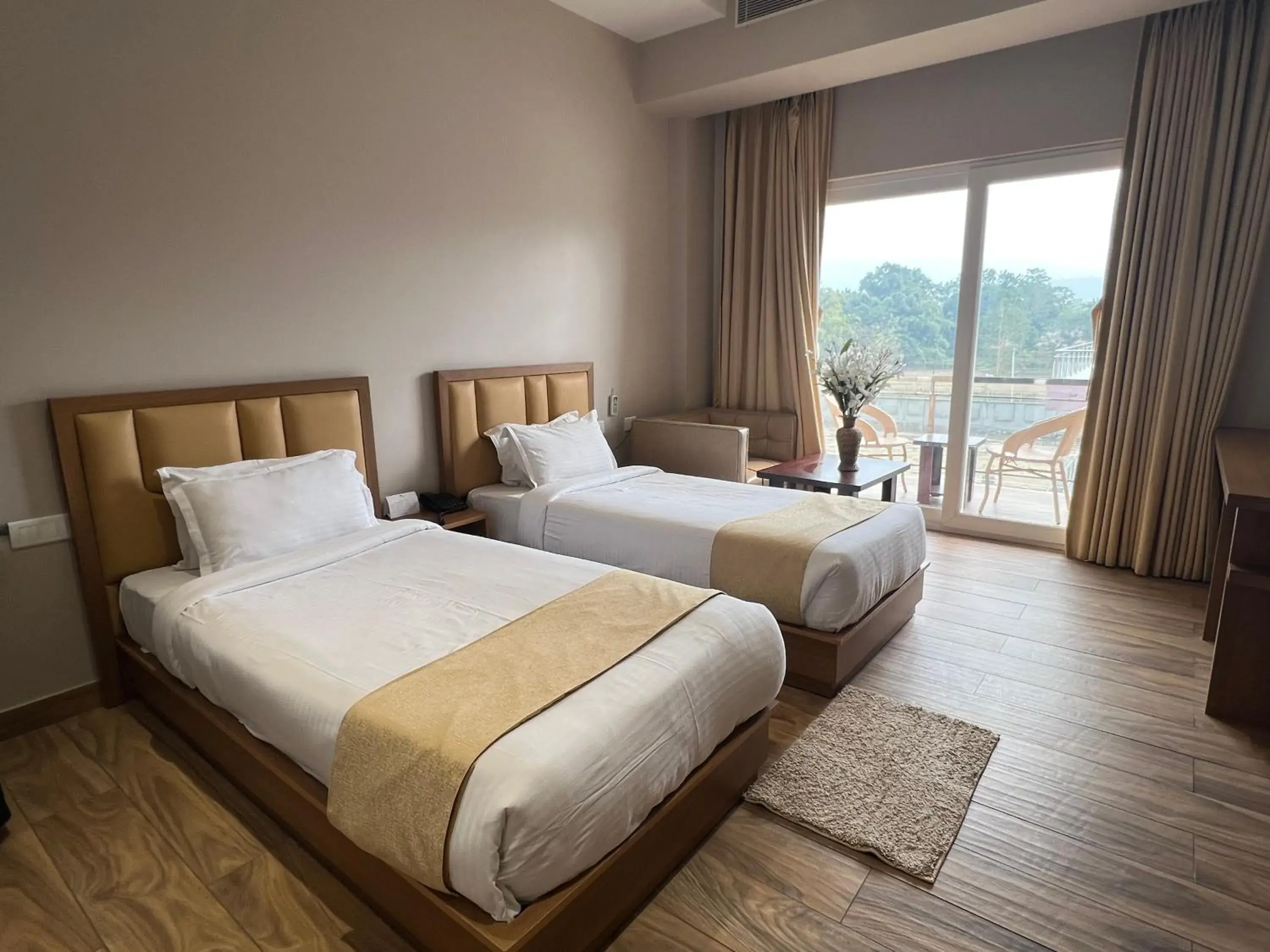 Twin Room with Balcony in Finn's Weaver Resort, Kaziranga Twin Room with Balcony in Finn's Weaver Resort, Kaziranga