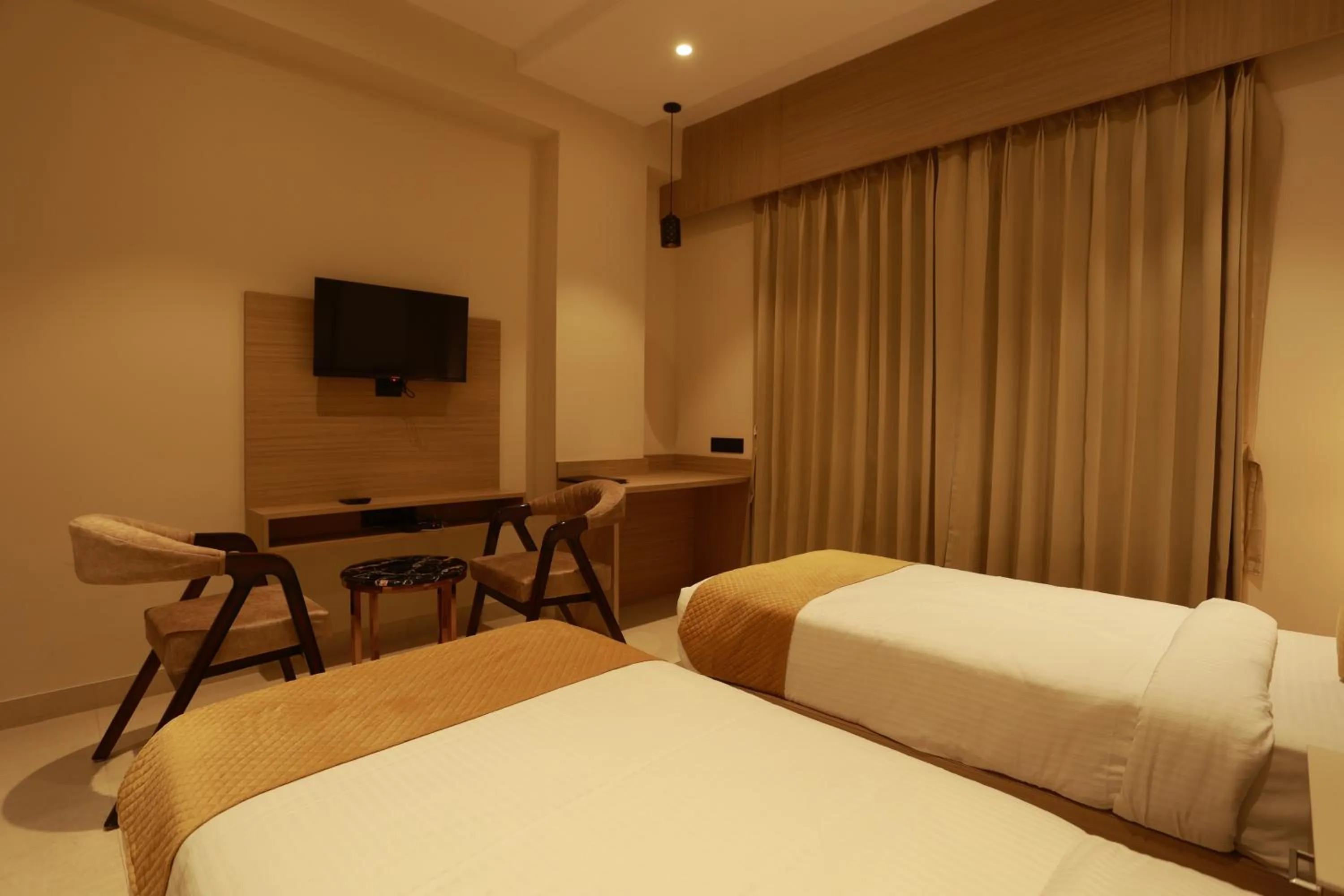 Bed in Hotel Taviral Regency