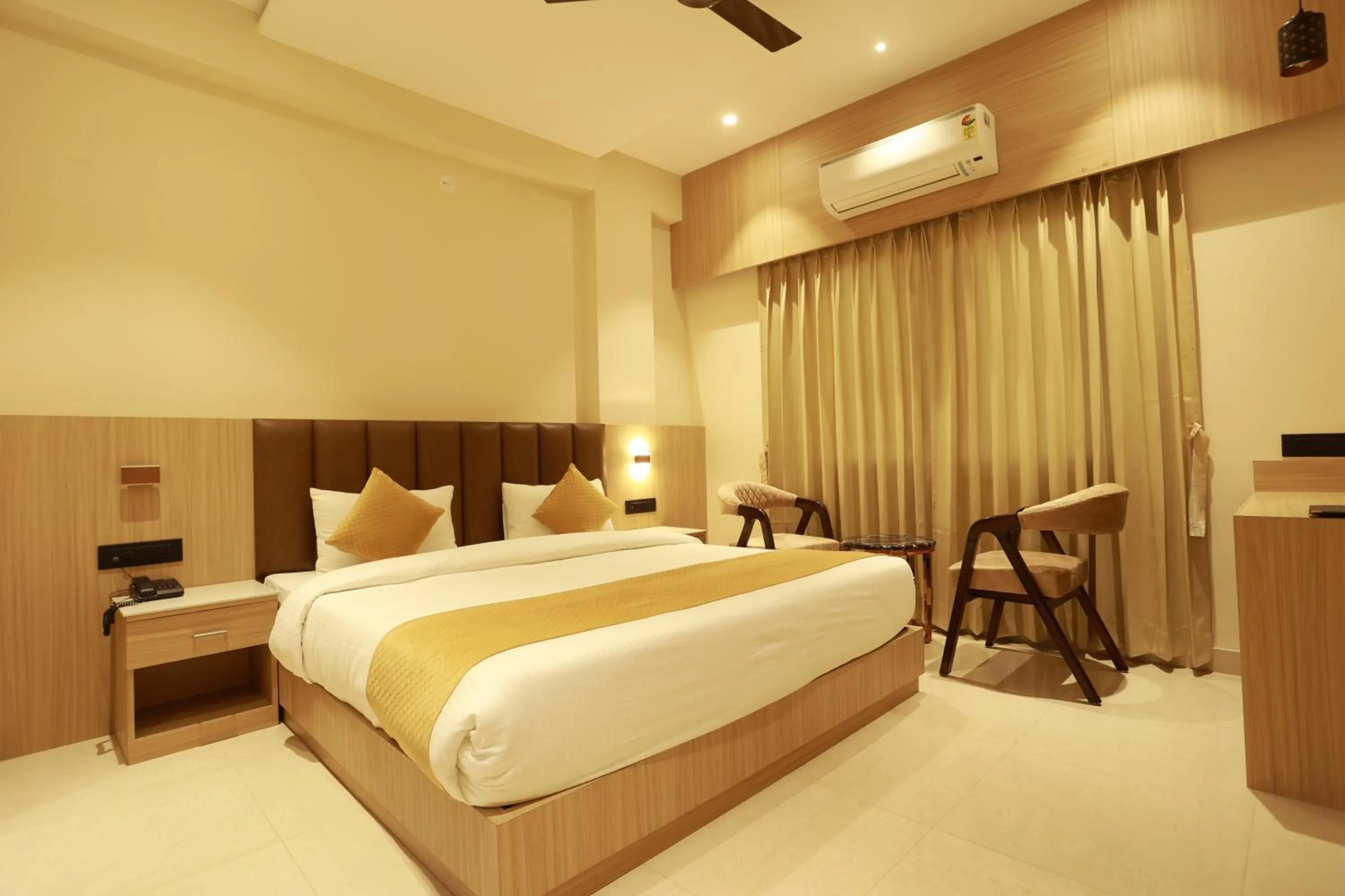 Bed in Hotel Taviral Regency