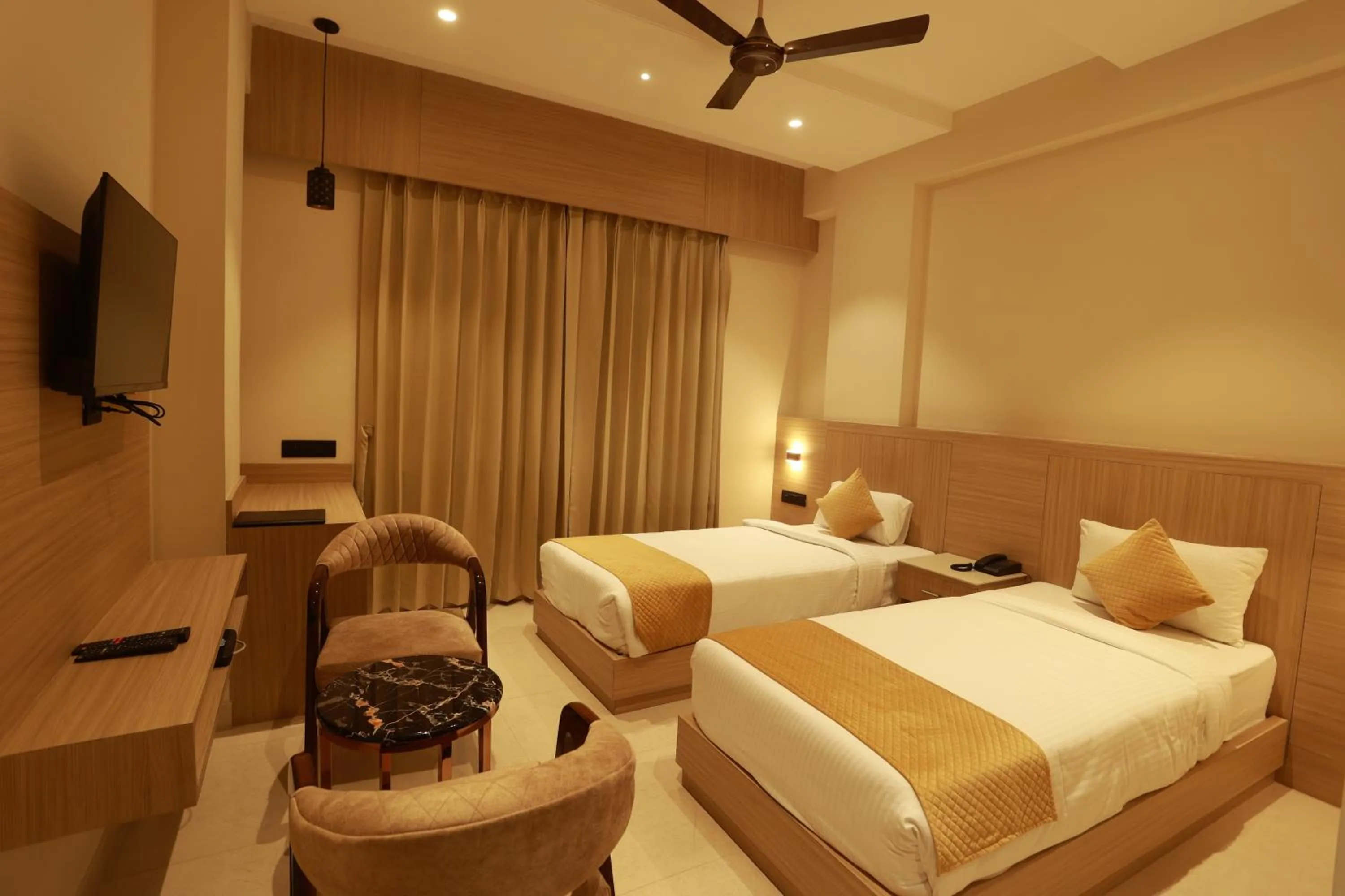 Bed in Hotel Taviral Regency