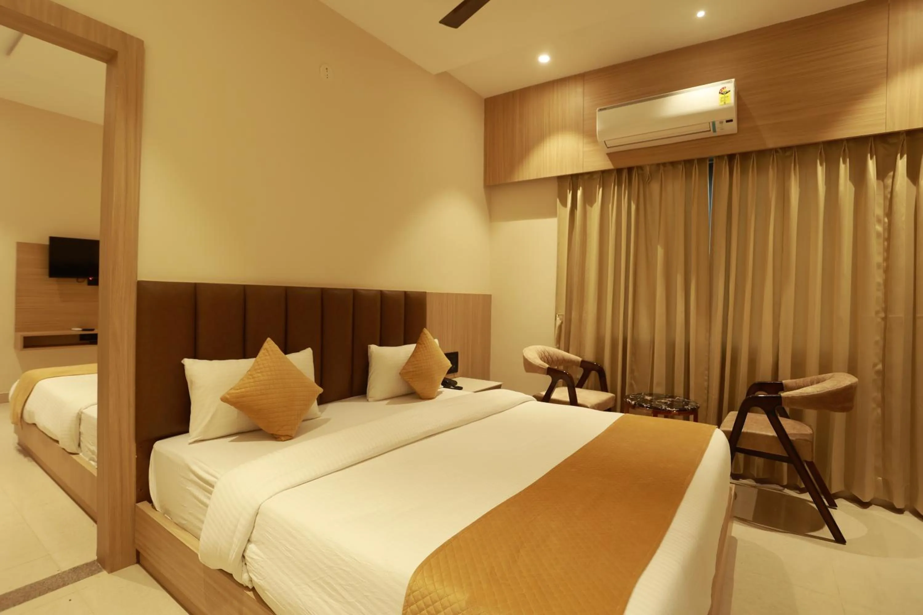 Bed in Hotel Taviral Regency
