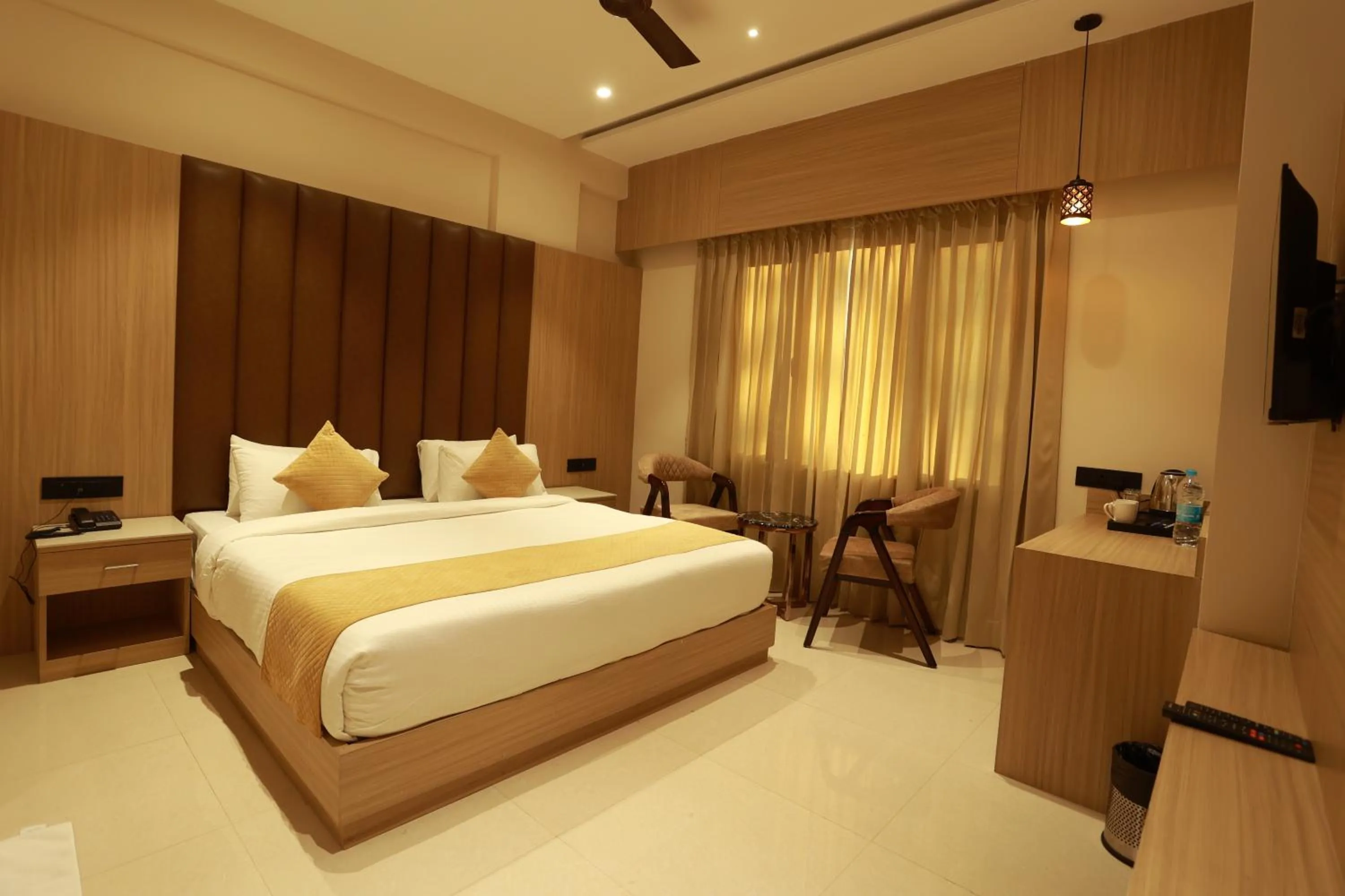 Bed in Hotel Taviral Regency