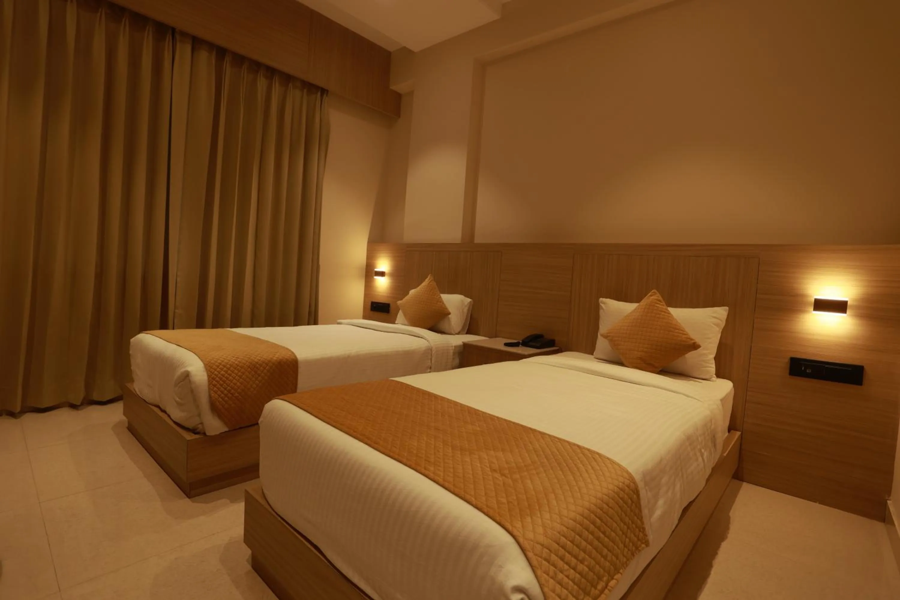 Bed in Hotel Taviral Regency
