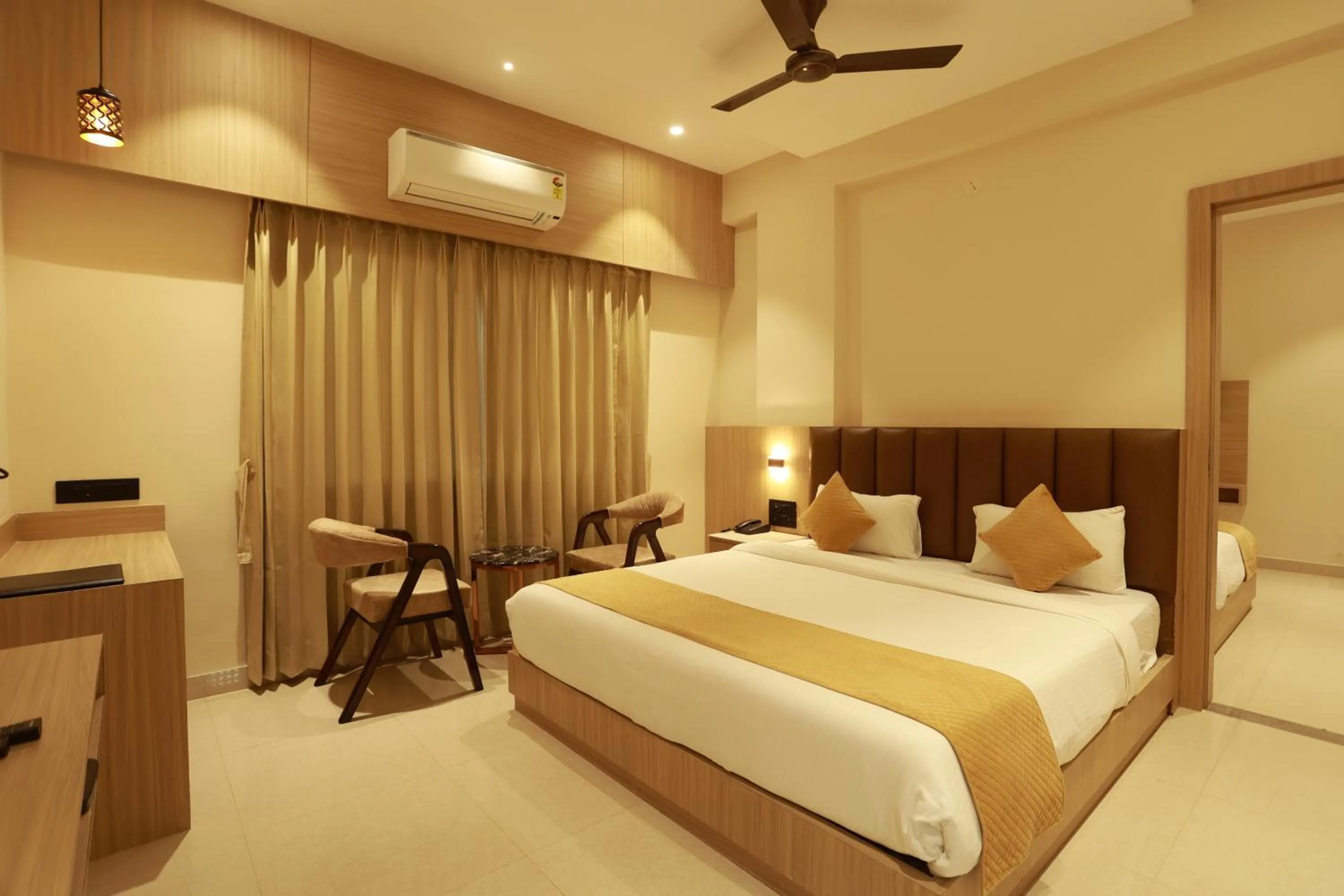 Bed in Hotel Taviral Regency