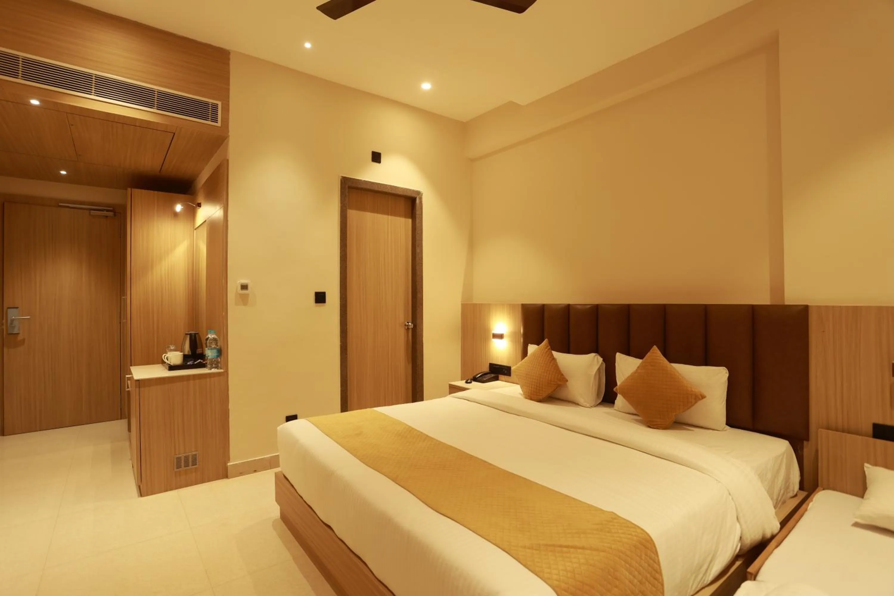 Bed in Hotel Taviral Regency