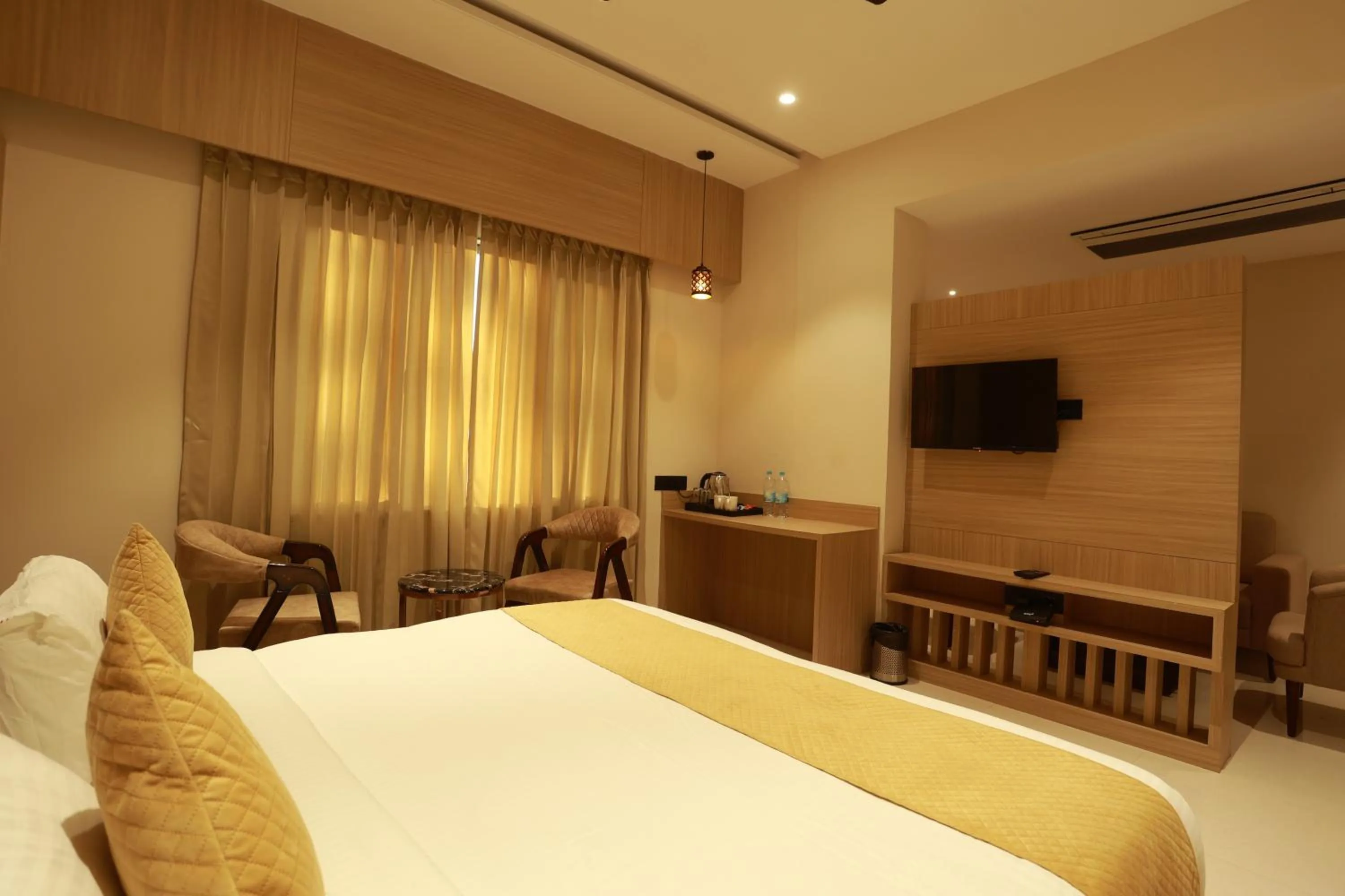 Bed in Hotel Taviral Regency