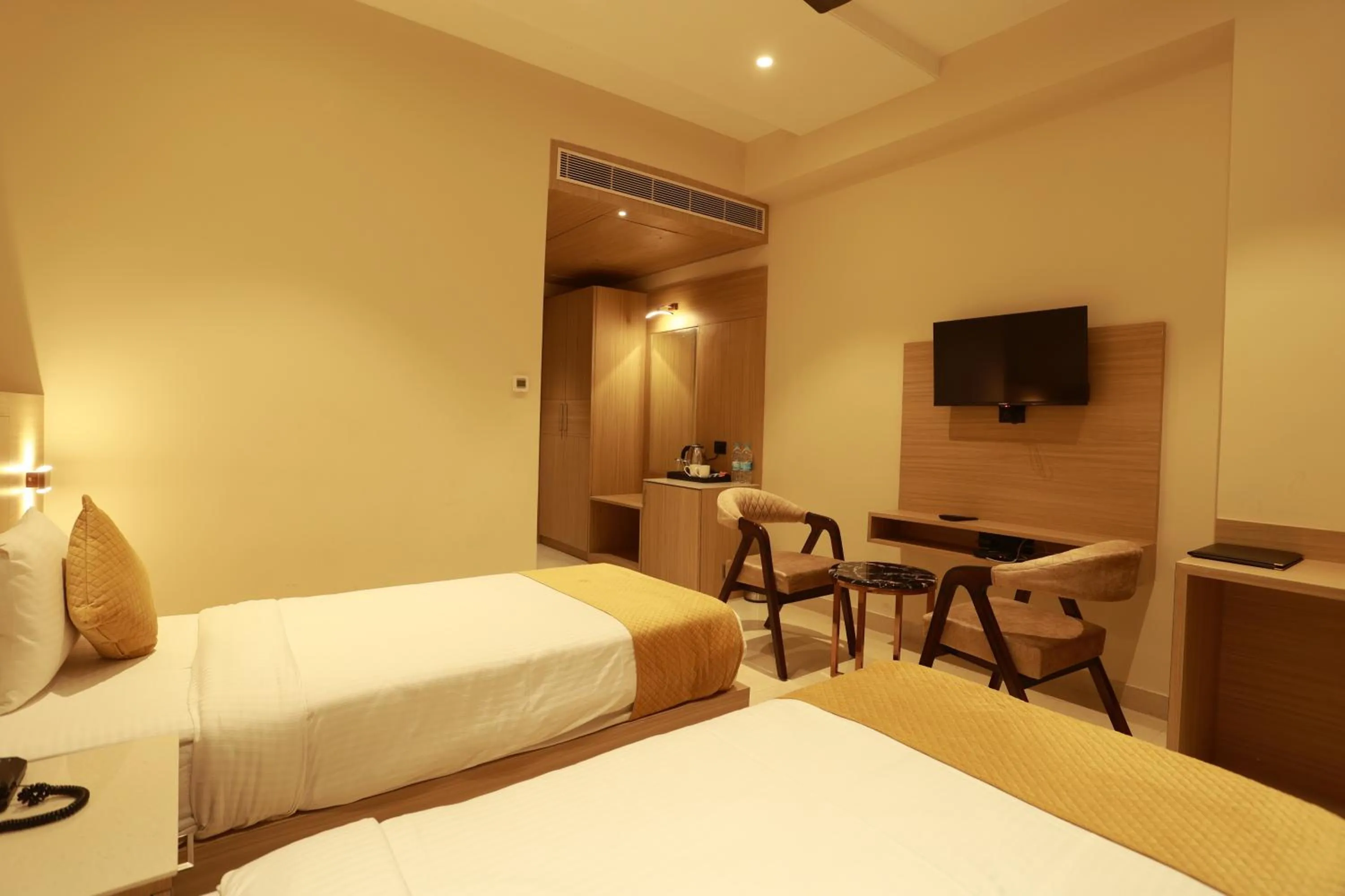 Bed in Hotel Taviral Regency