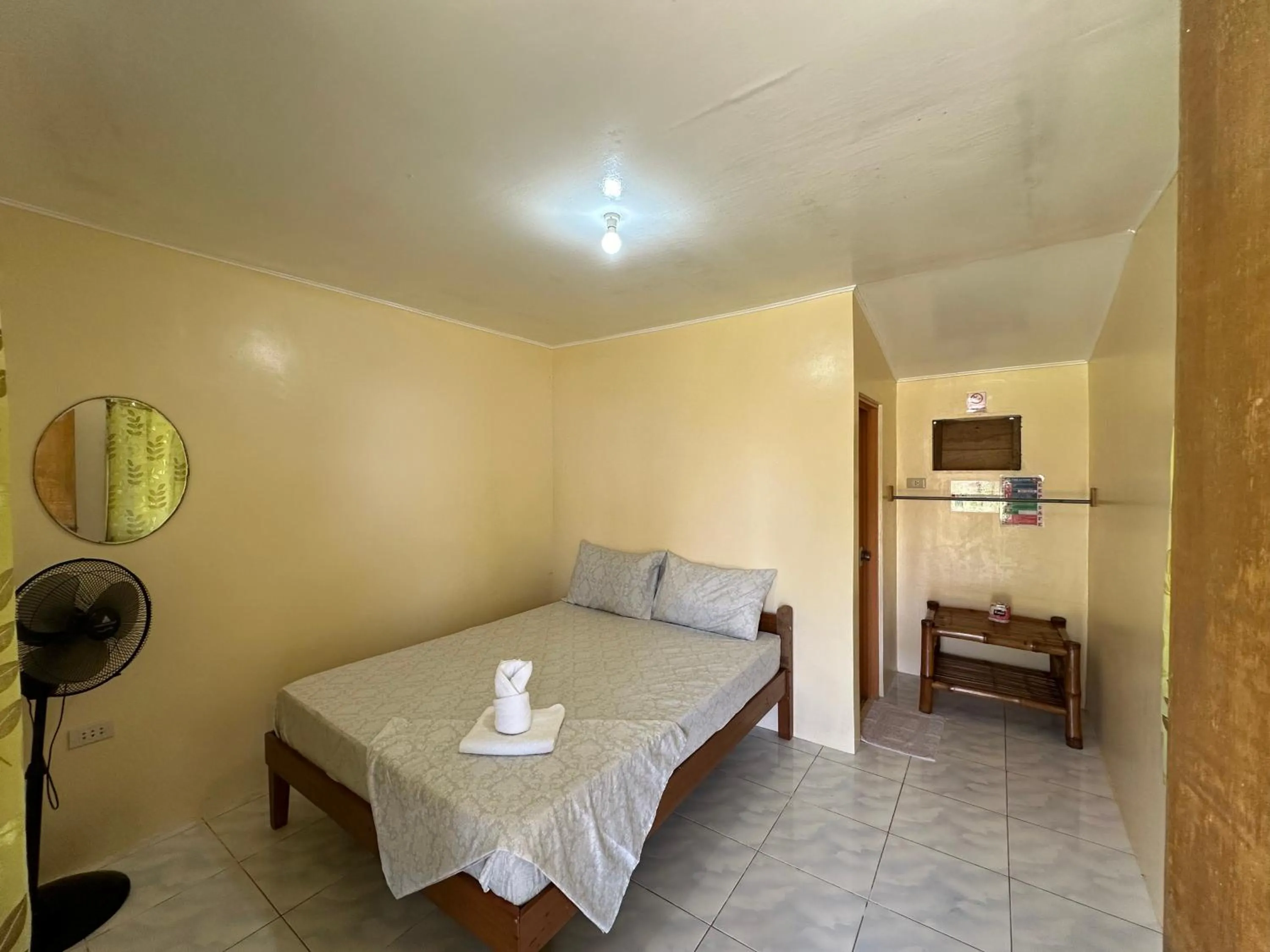 Bed in Dancalan Beach Resort