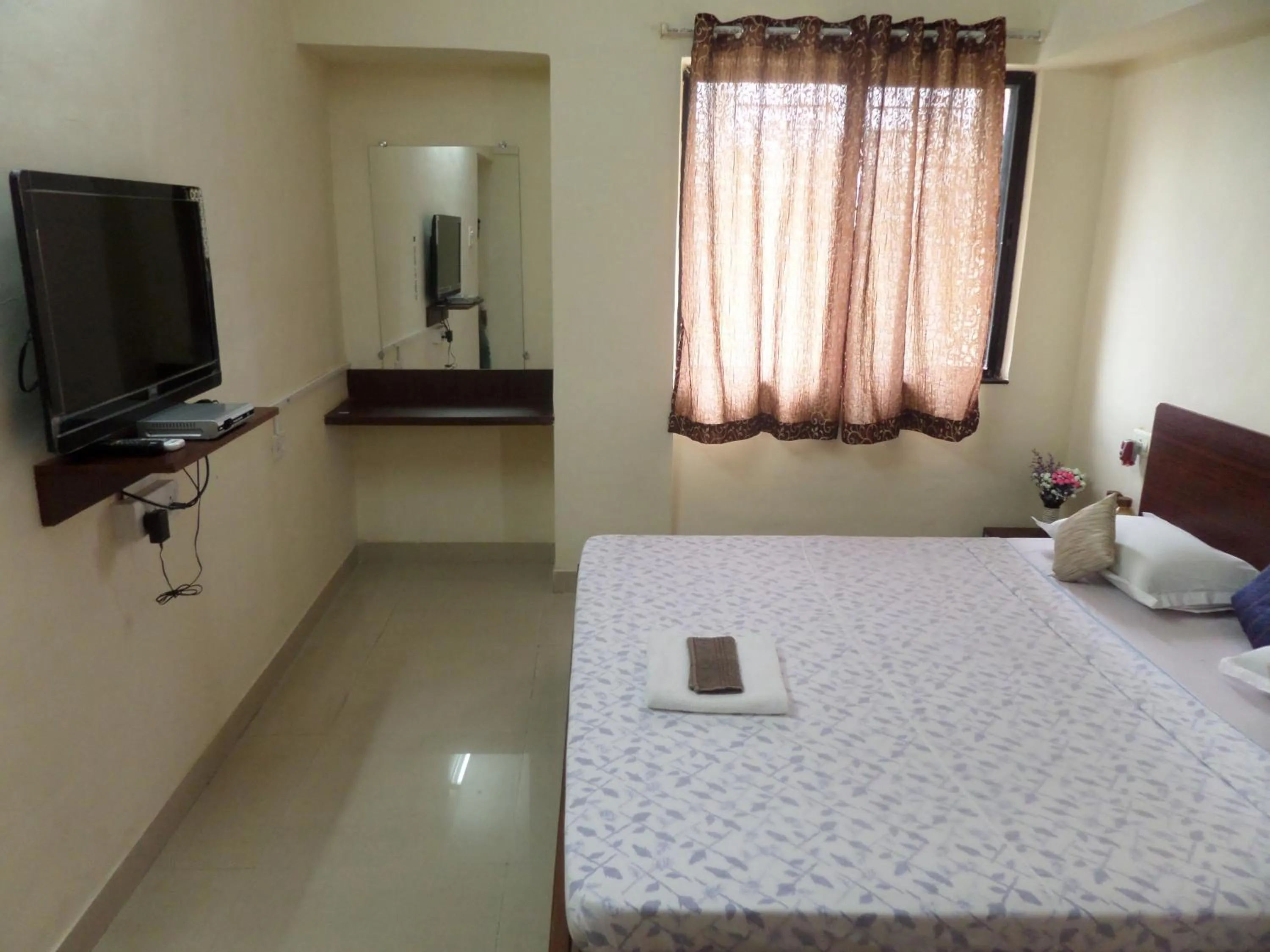 Bed in Cosmos Luxury Vimannagar