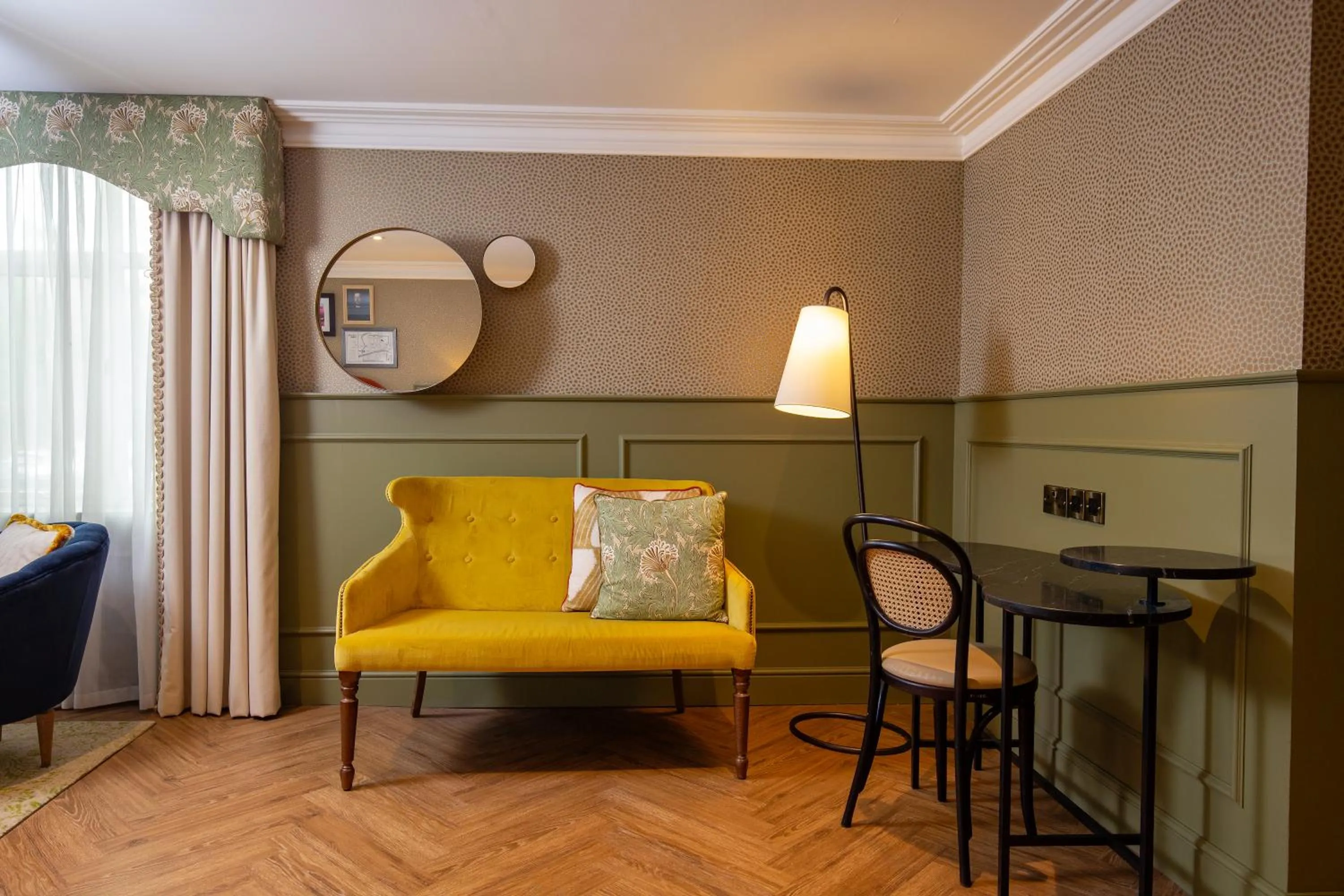 Seating area in Elmbank York, Tapestry Collection by Hilton