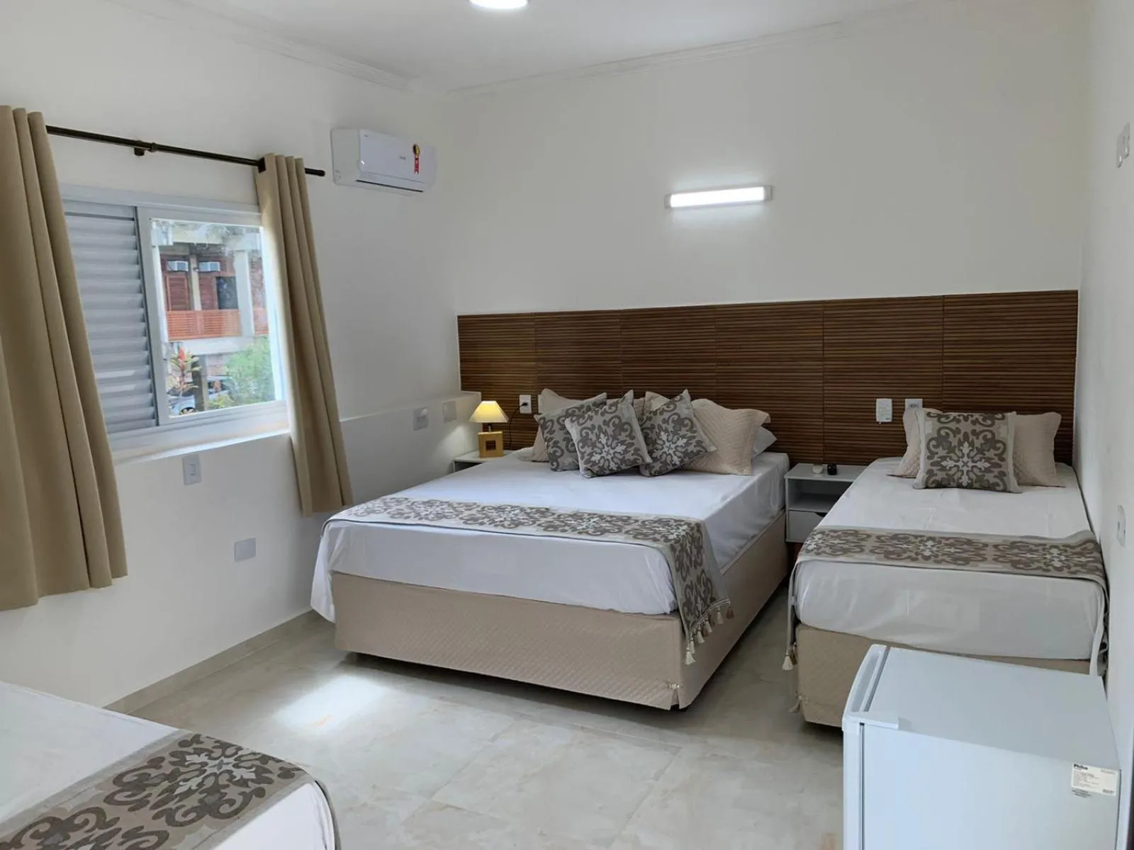 Queen Suite in Pousada Pé na Areia Guarujá