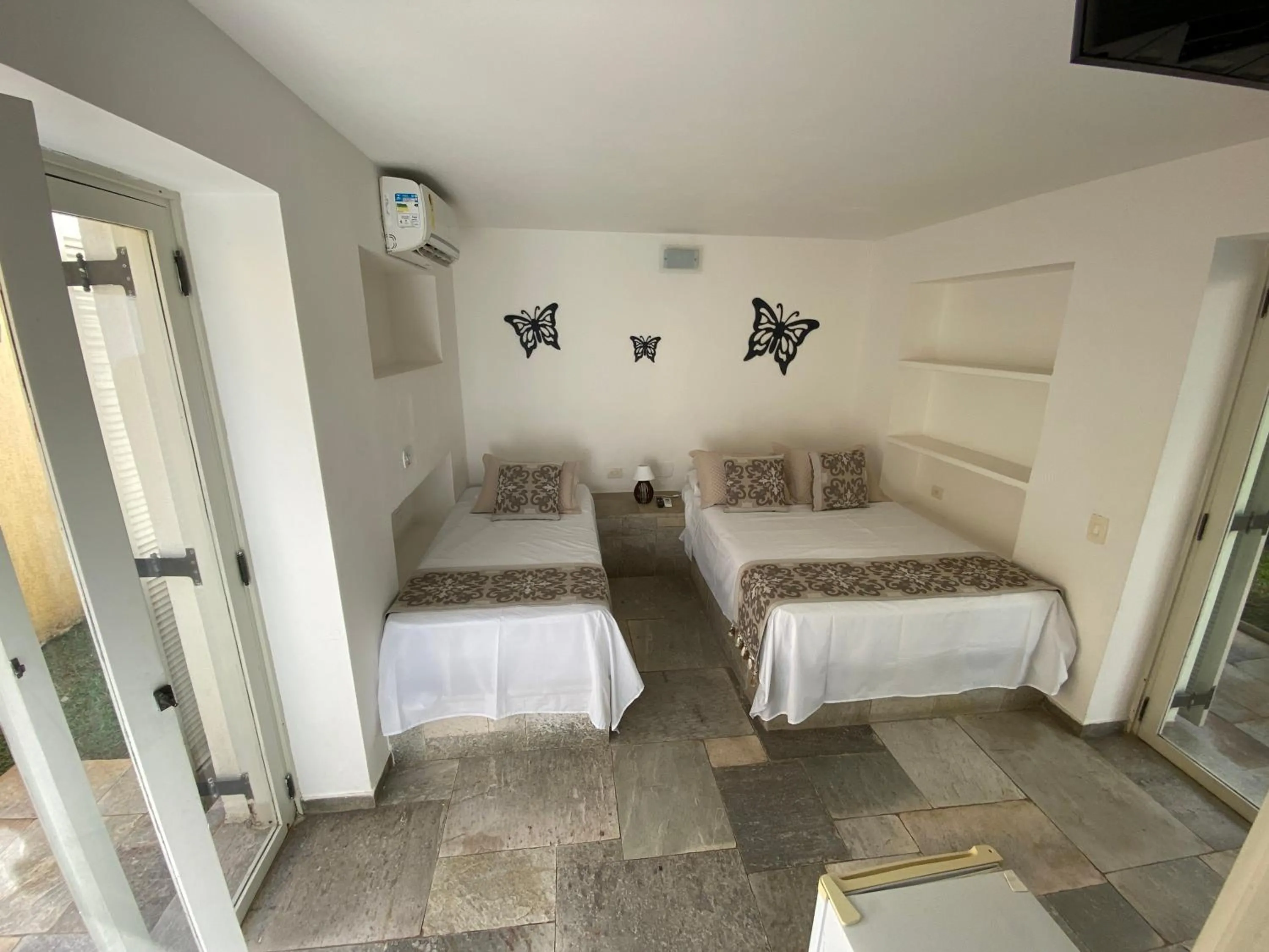 Junior Suite with Terrace in Pousada Pé na Areia Guarujá