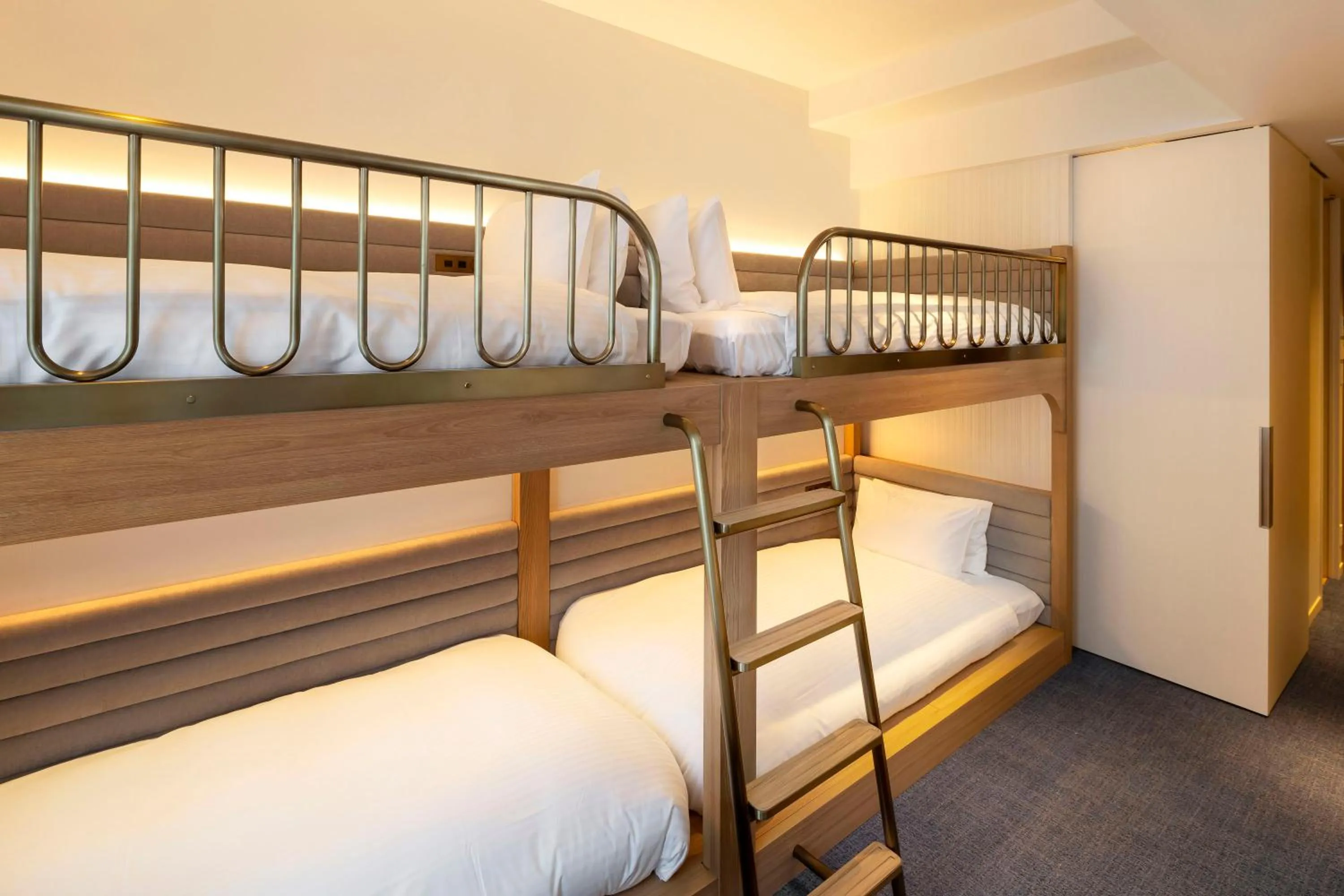 Bed in Hotel Comento Yokohama Kannai