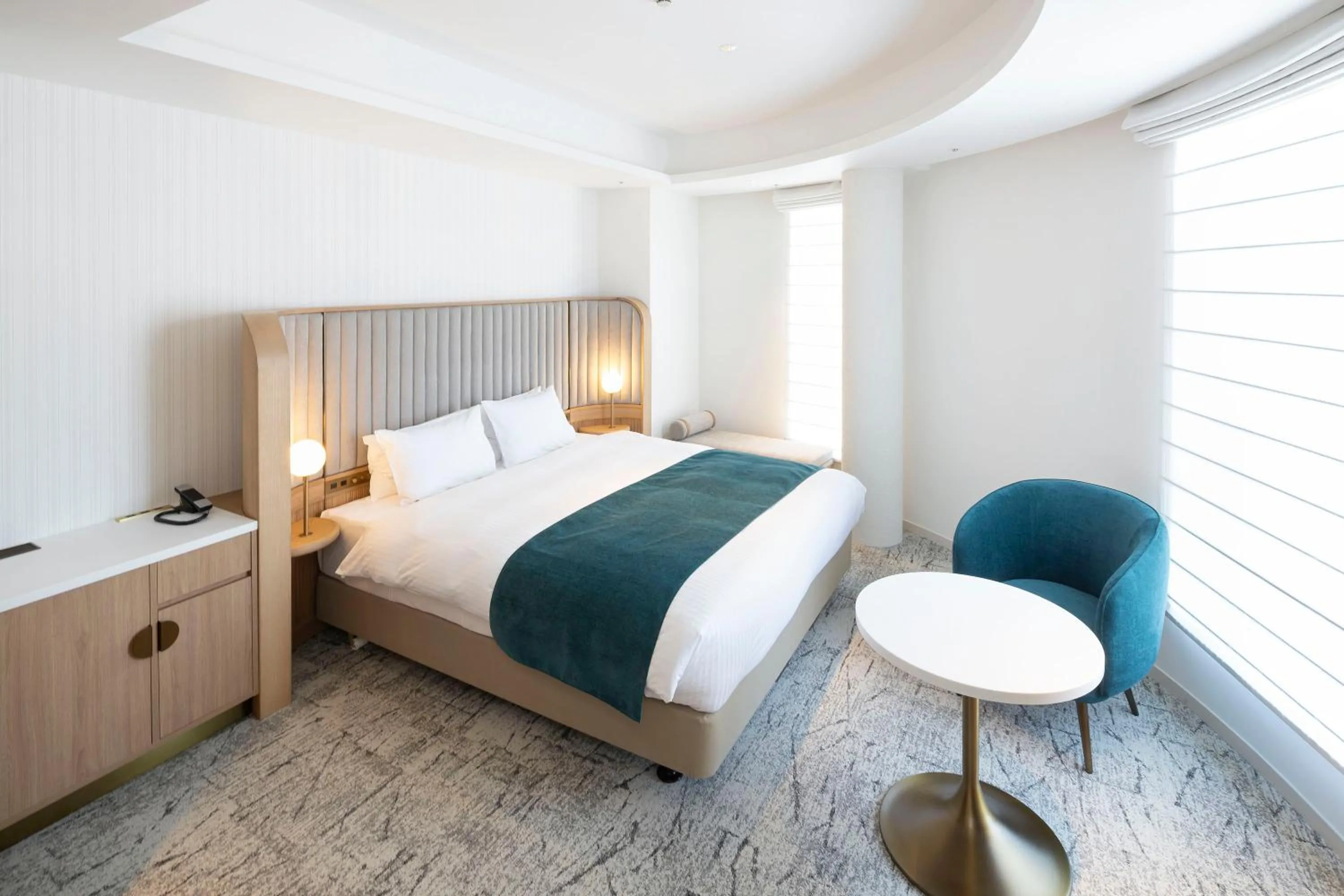 Bed in Hotel Comento Yokohama Kannai