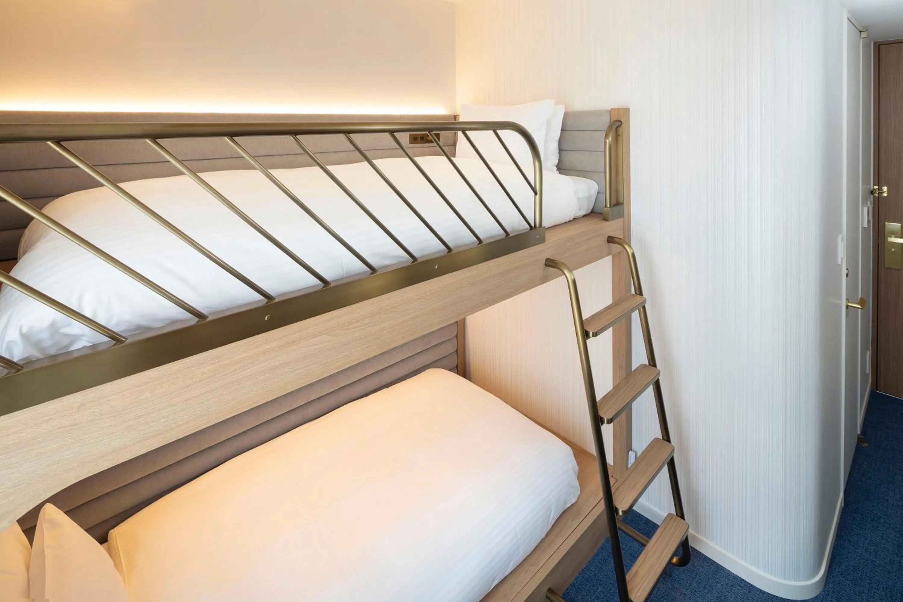 Bed in Hotel Comento Yokohama Kannai