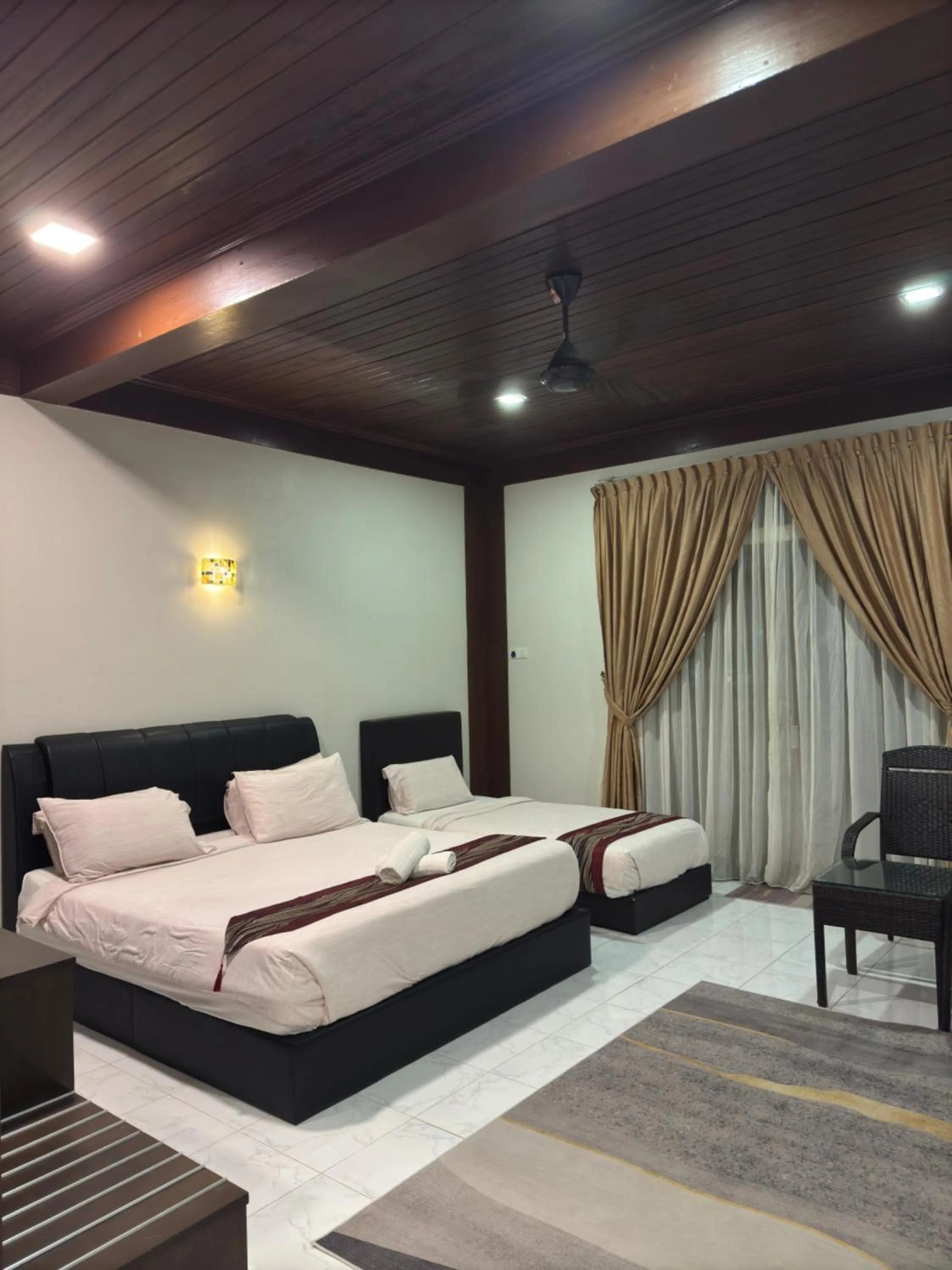 Bed in Singgahsana Villa Langkawi