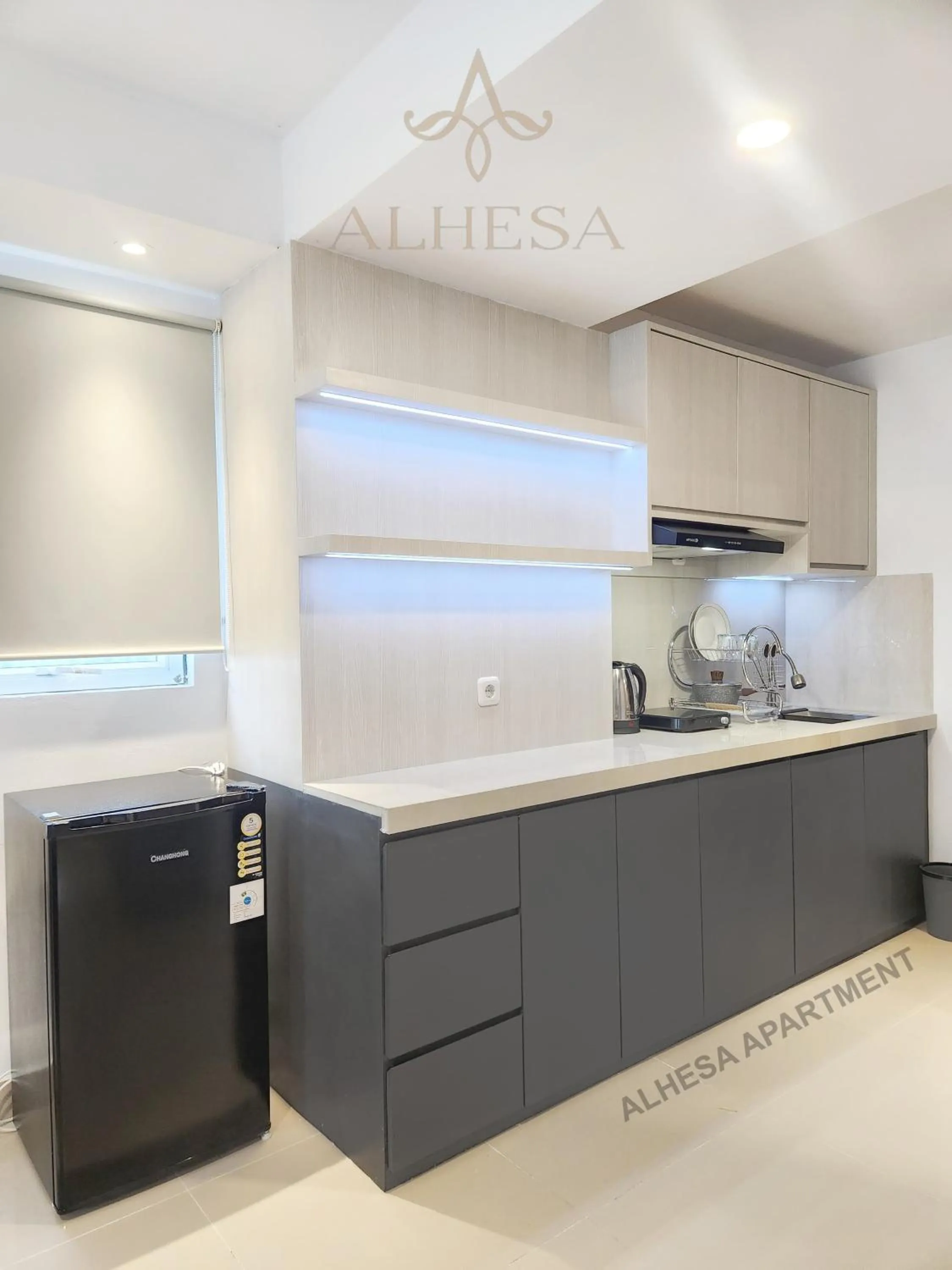 Kitchen or kitchenette in Alhesa Apartment