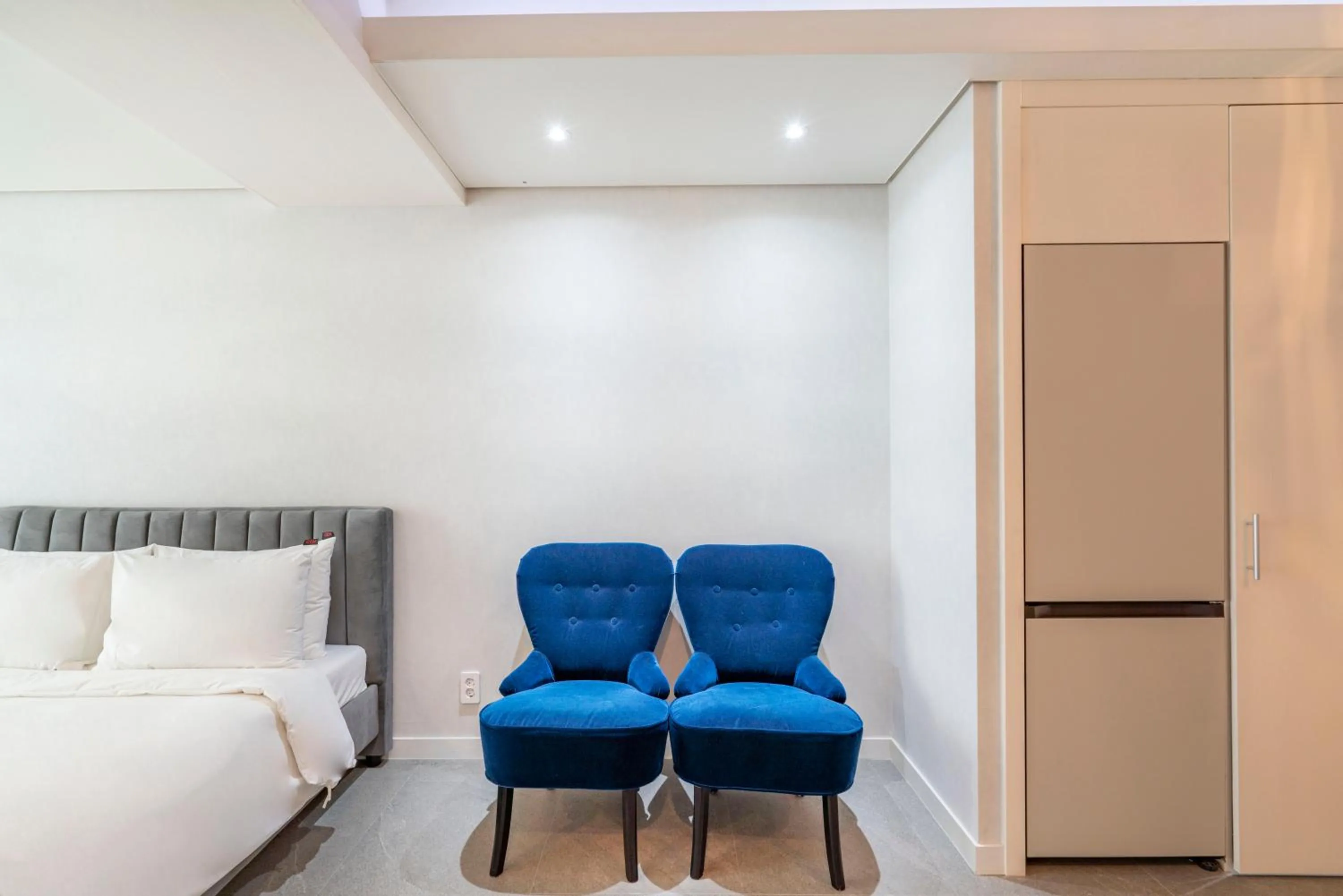 Seating area, Bed in Centum Convention Hotel In Centum