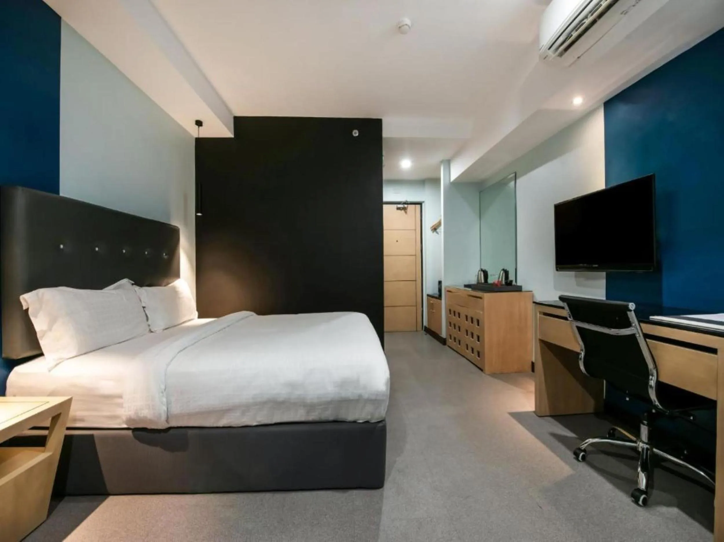 Bed in Homes at Bay Area Suites by SMS Hospitality