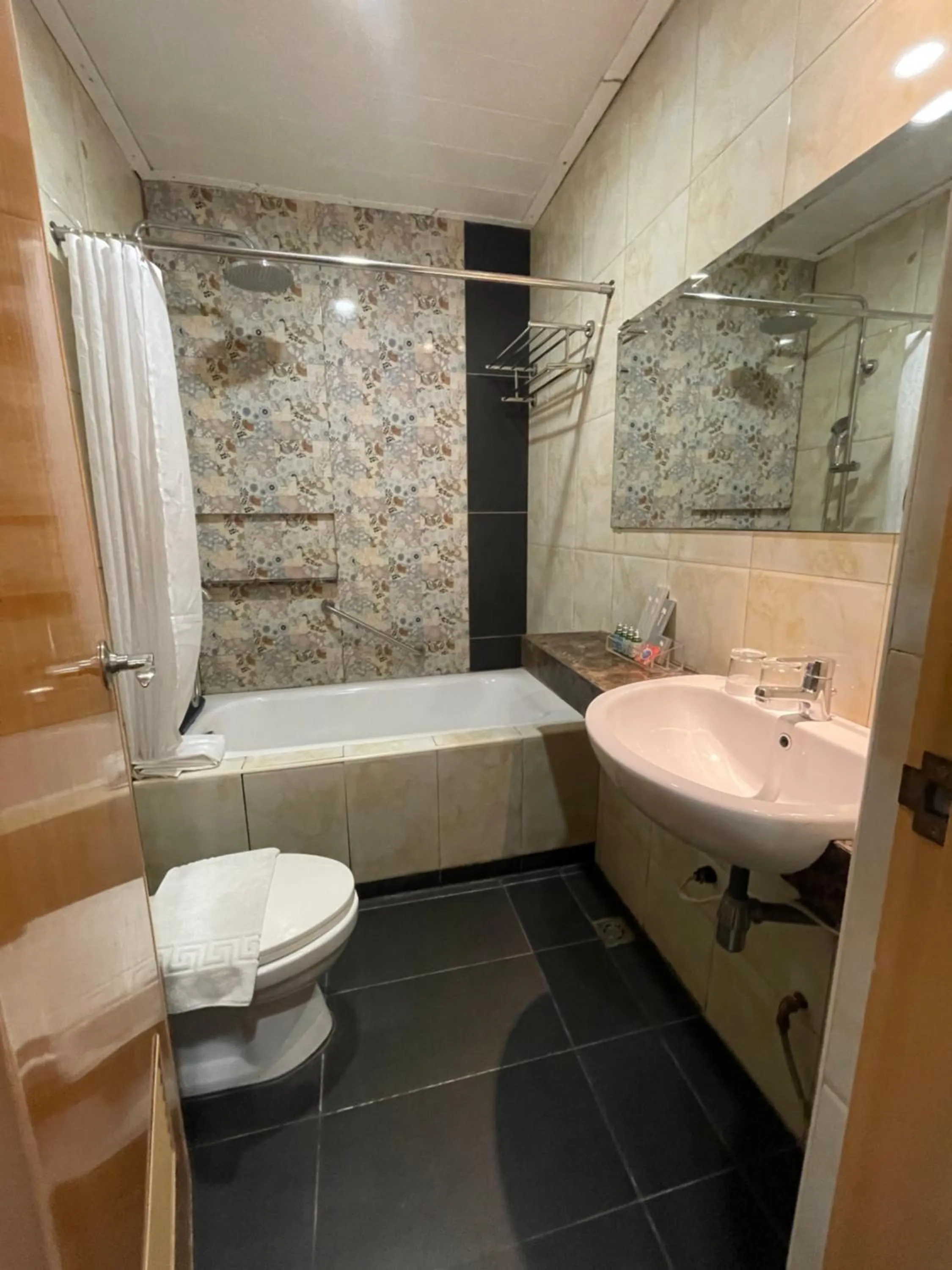 Shower in Homes at Bay Area Suites by SMS Hospitality