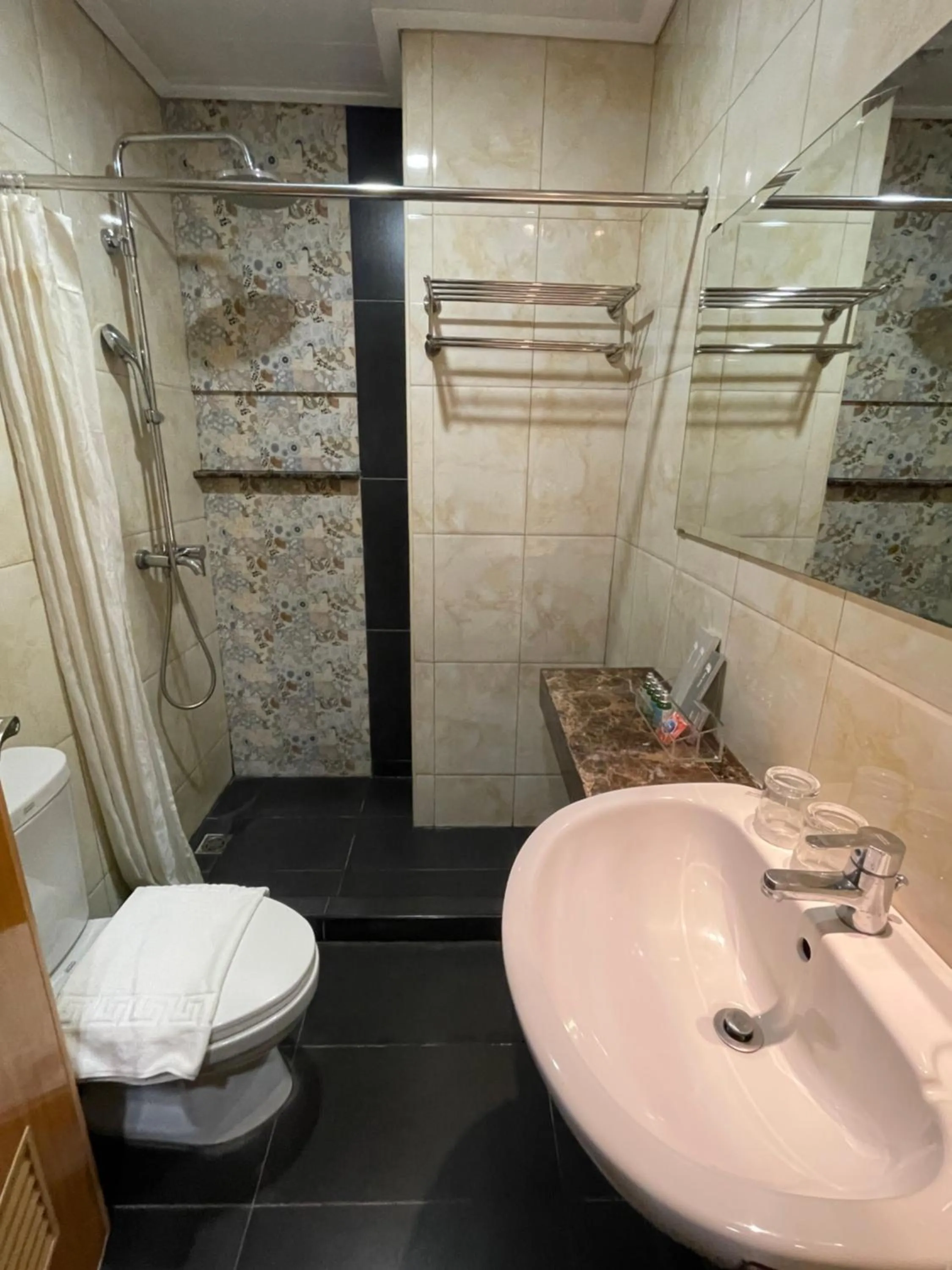 Shower in Homes at Bay Area Suites by SMS Hospitality