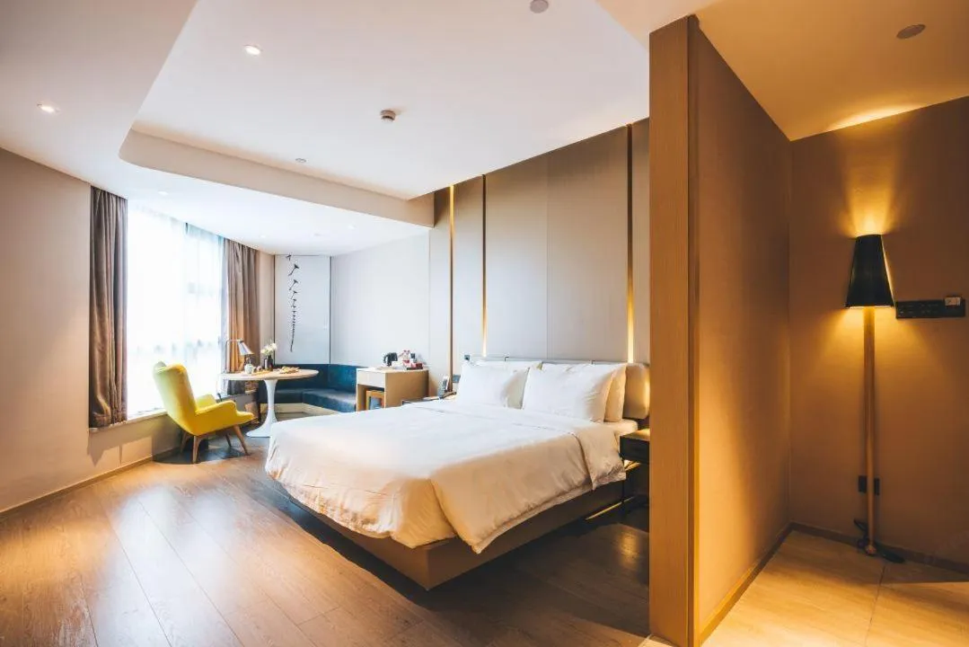 Bed in Atour Hotel Hangzhou Binjiang Olympic Sports