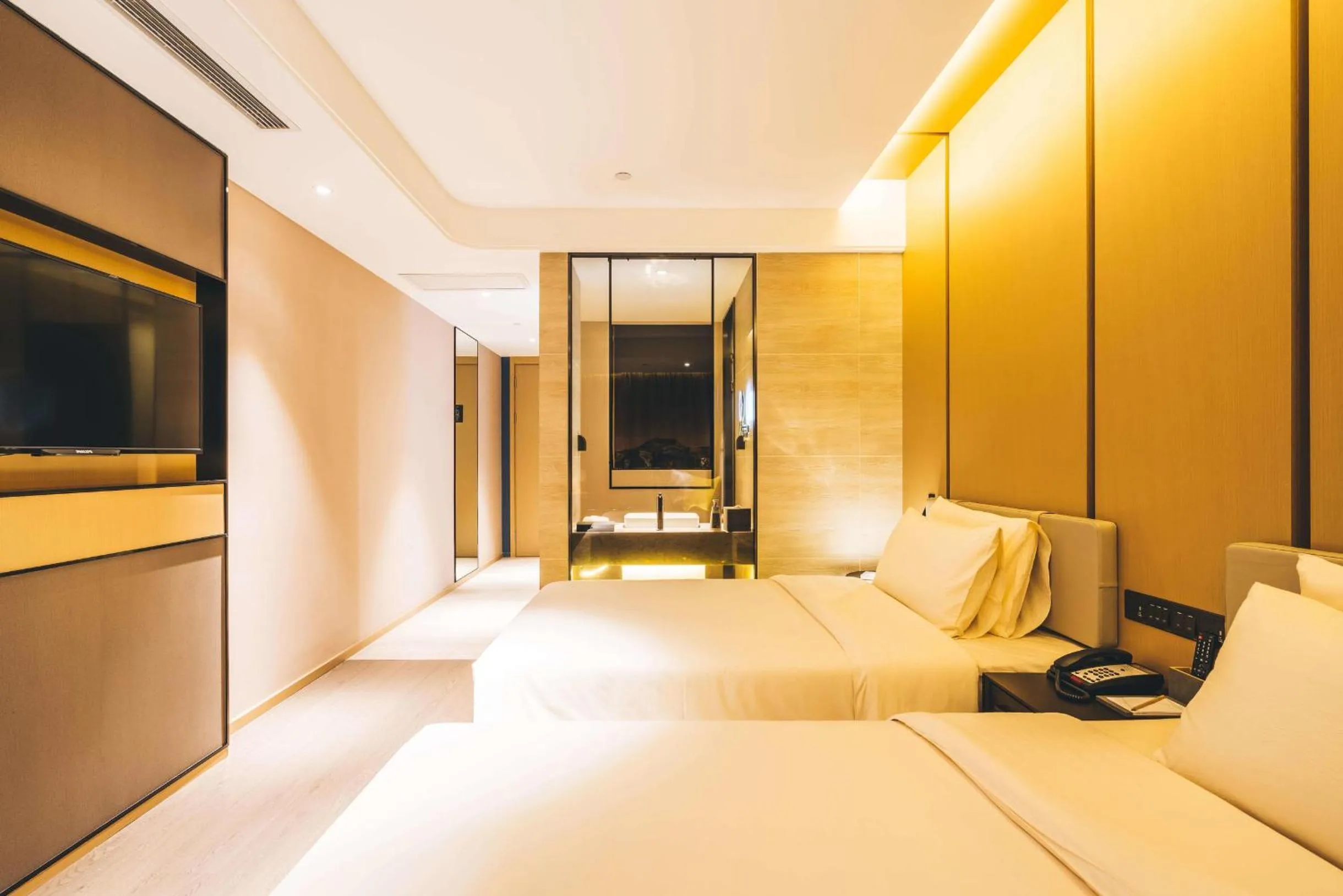 Bed in Atour Hotel Hangzhou Binjiang Olympic Sports