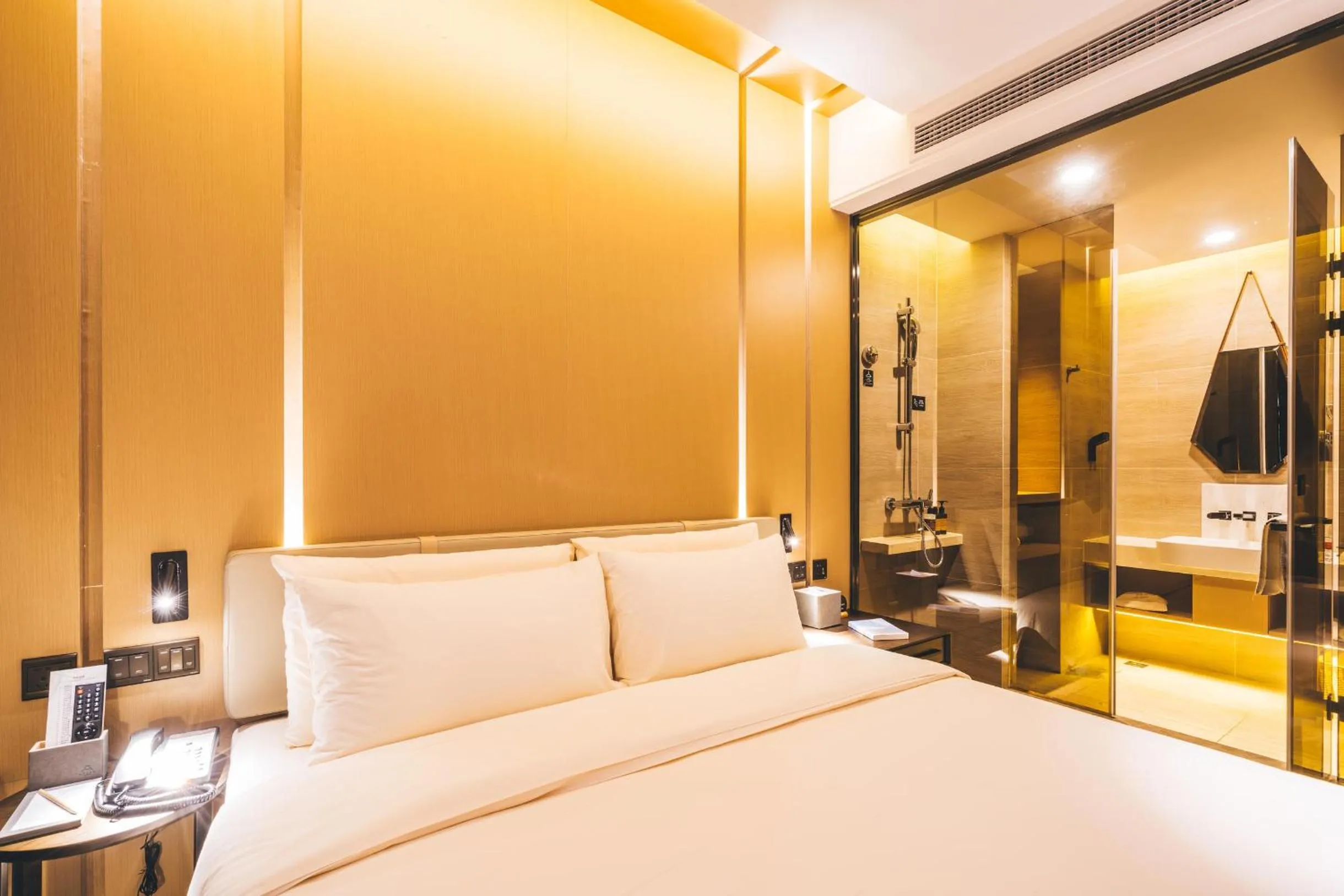 Bed in Atour Hotel Hangzhou Binjiang Olympic Sports