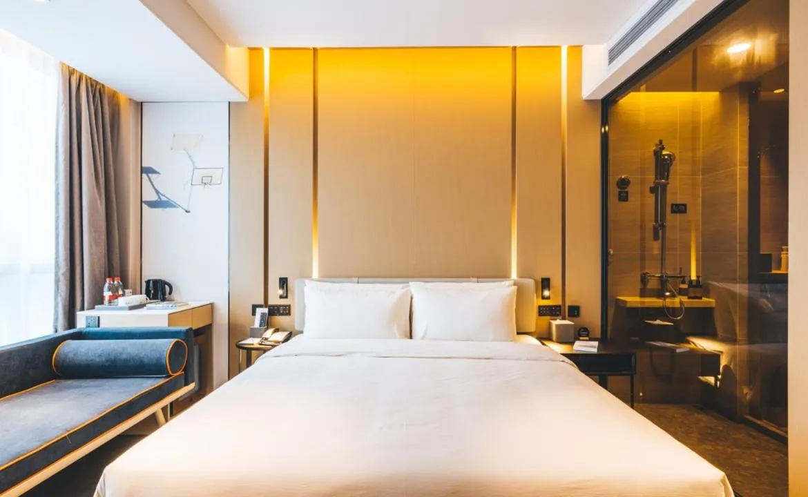 Bed in Atour Hotel Hangzhou Binjiang Olympic Sports