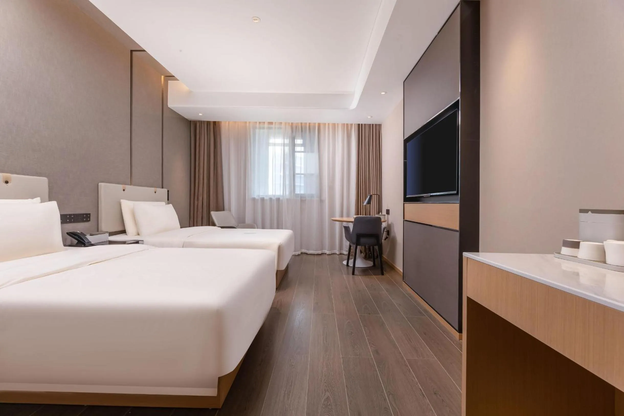 Bed in Atour Hotel Zhijiang Bridge