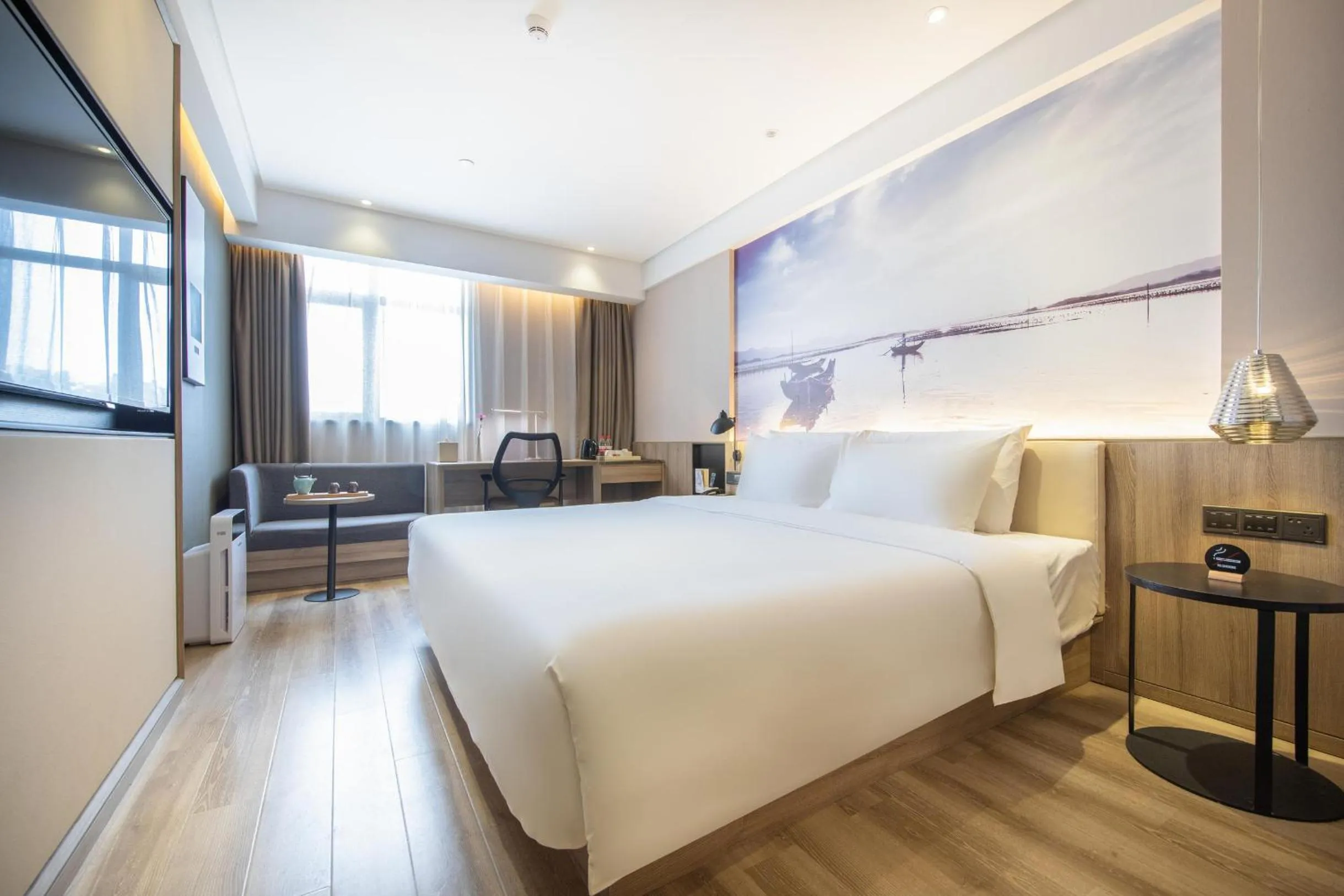Photo of the whole room, Bed in Atour Hotel Huizhou Huiyang High-speed Railway Station