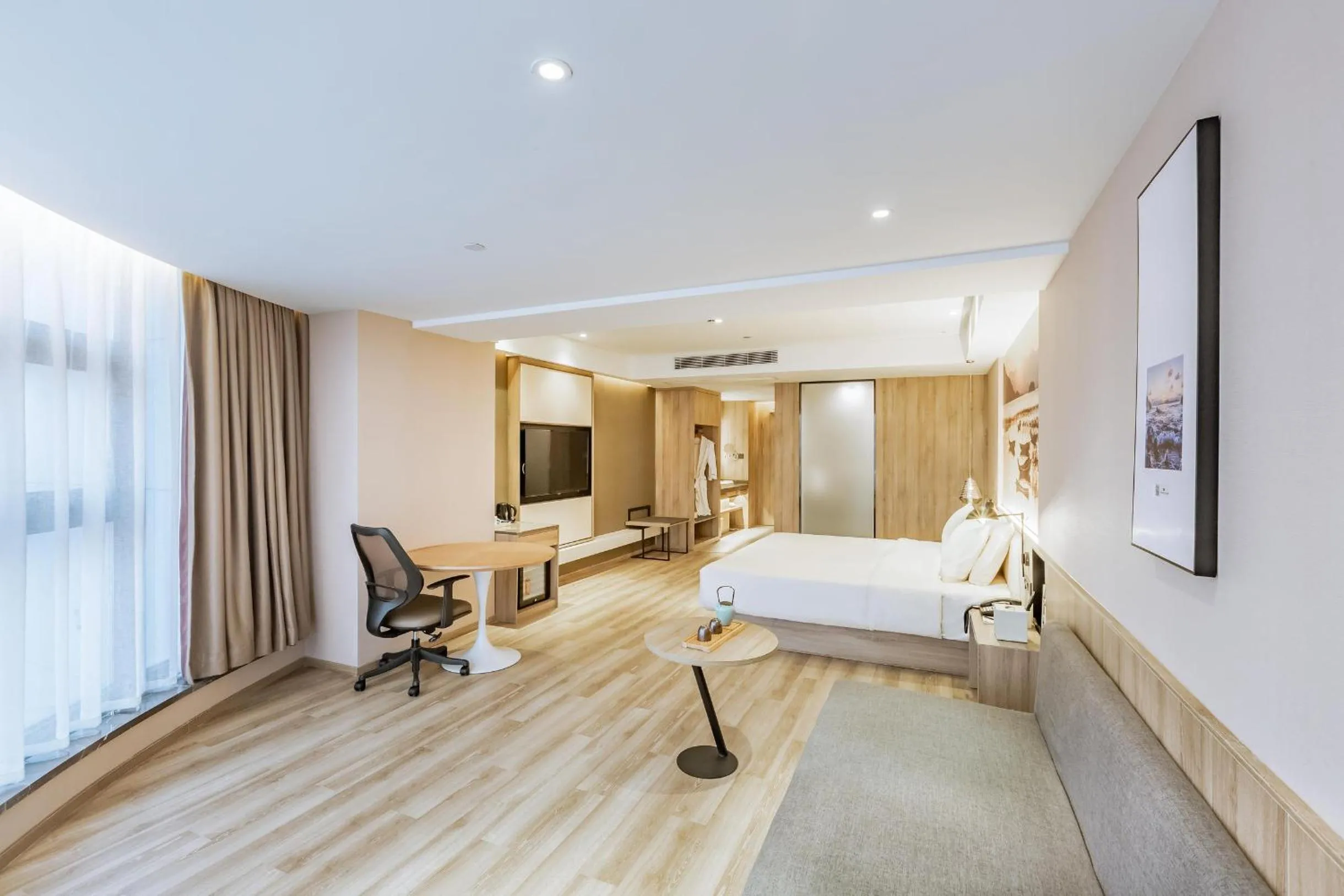 Bed in Atour Hotel Huizhou Huiyang High-speed Railway Station