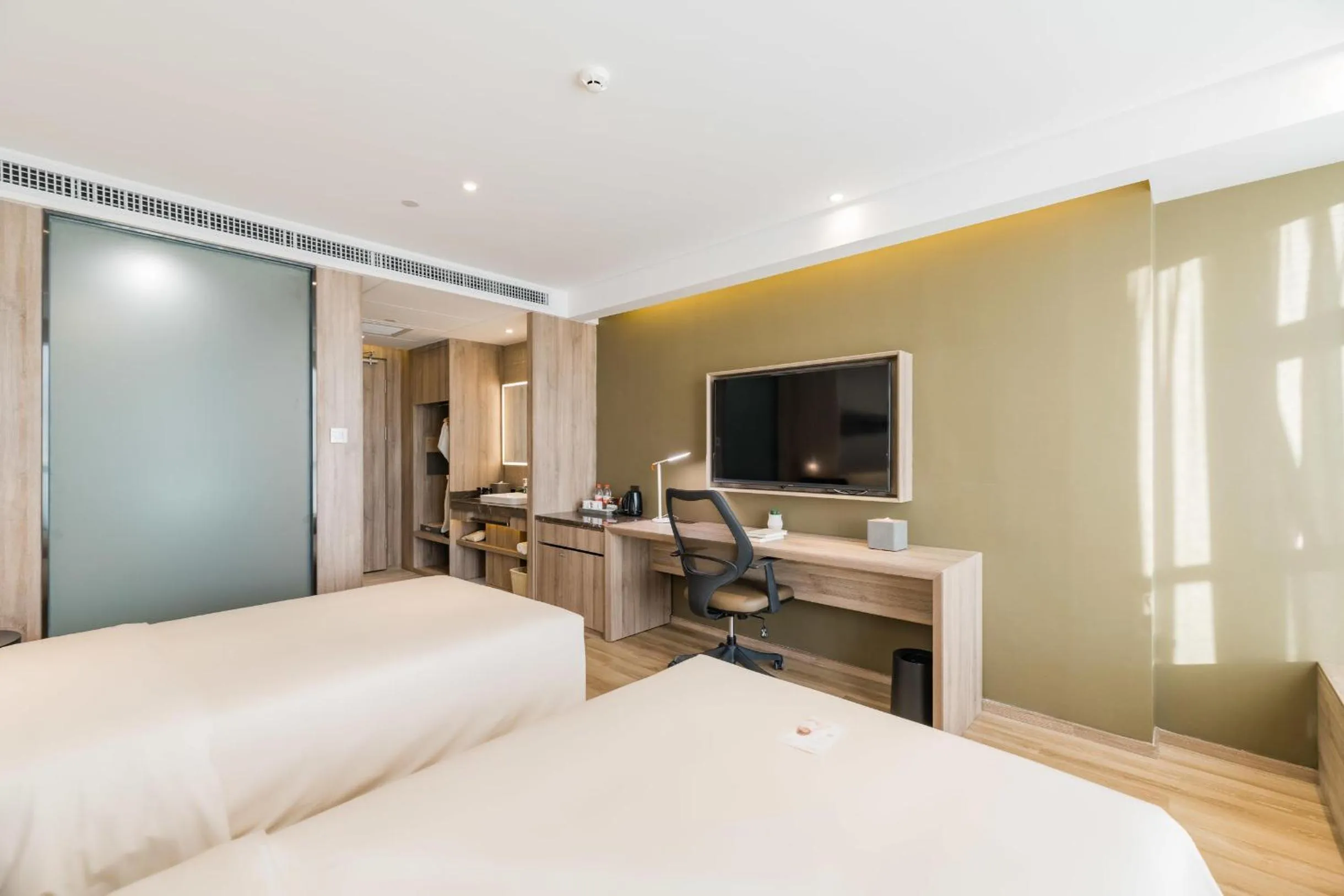 Bed in Atour Hotel Kunming Dashanghui