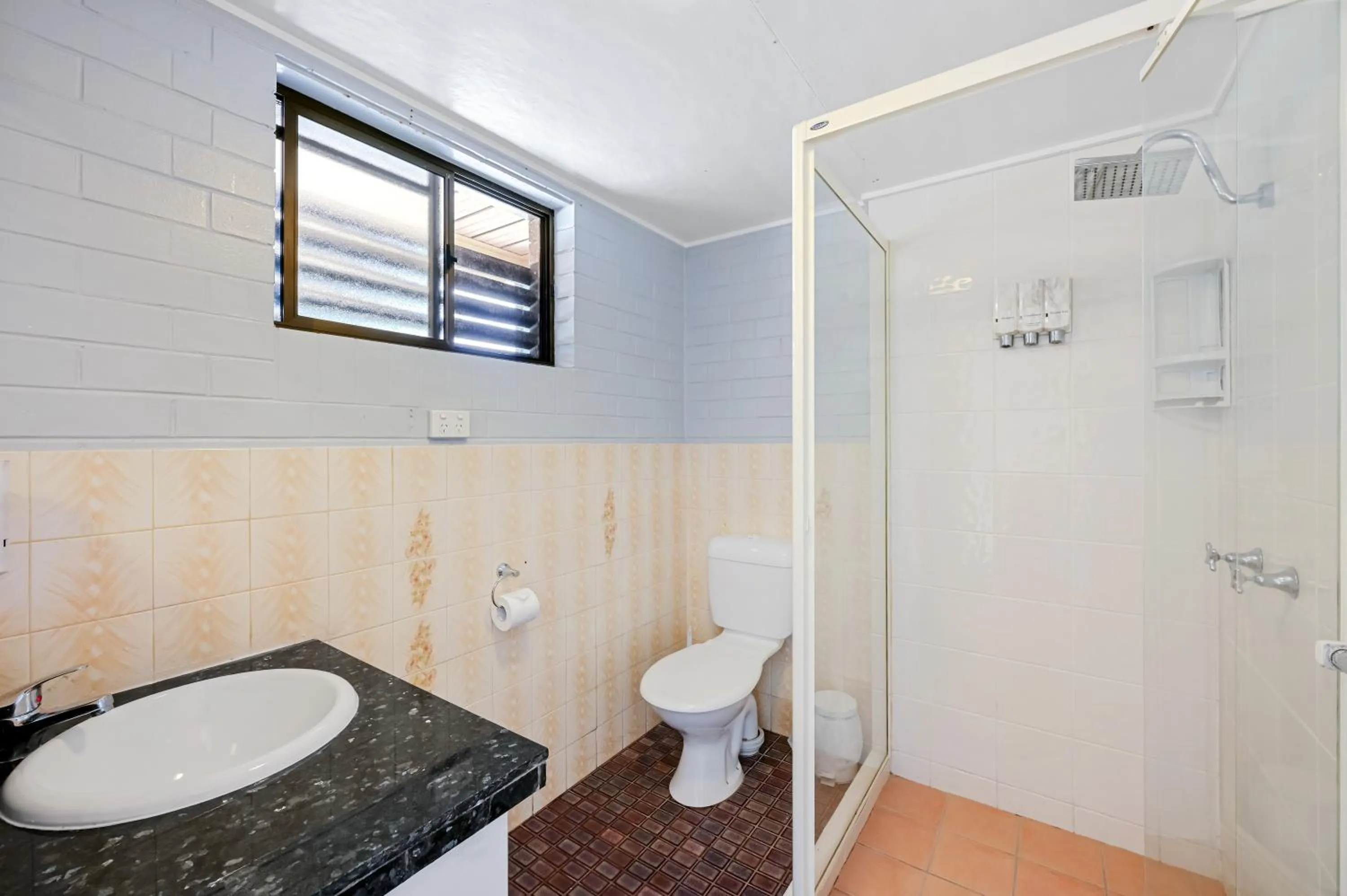 Bathroom in Raceview Motor Inn