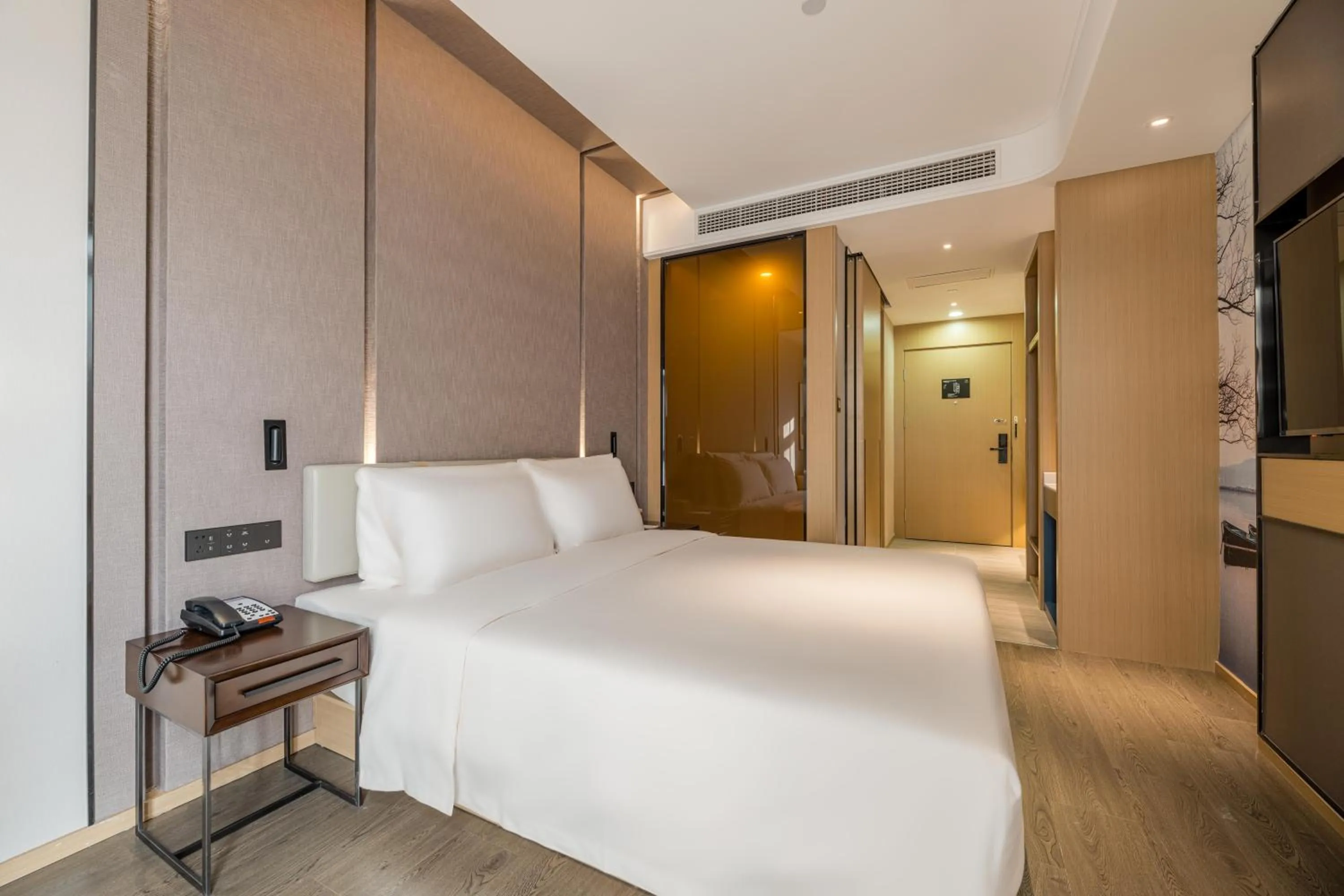 Bed in Atour Hotel Hangzhou Qianjiang Century City International Expo Center