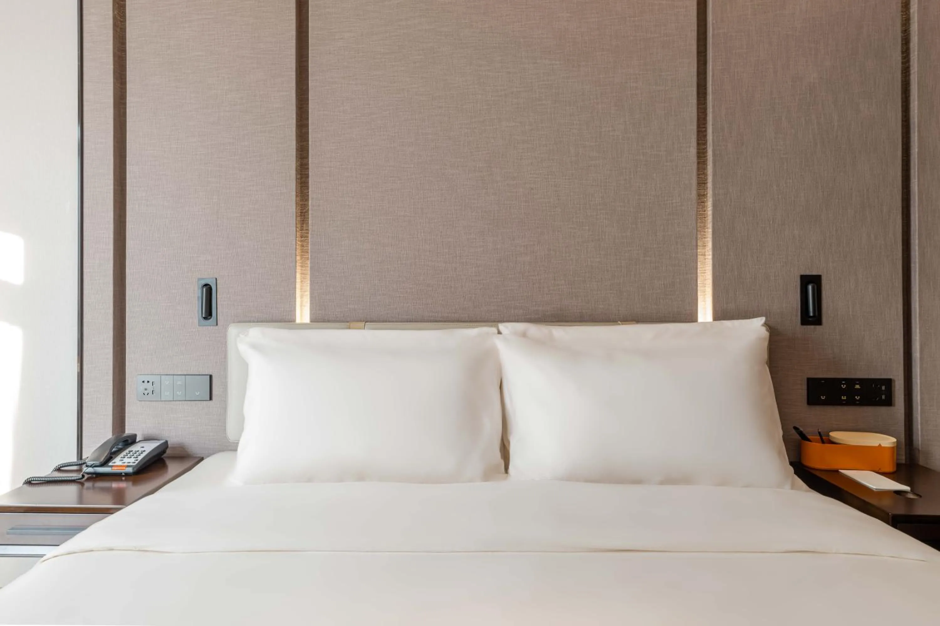 Bed in Atour Hotel Hangzhou Qianjiang Century City International Expo Center