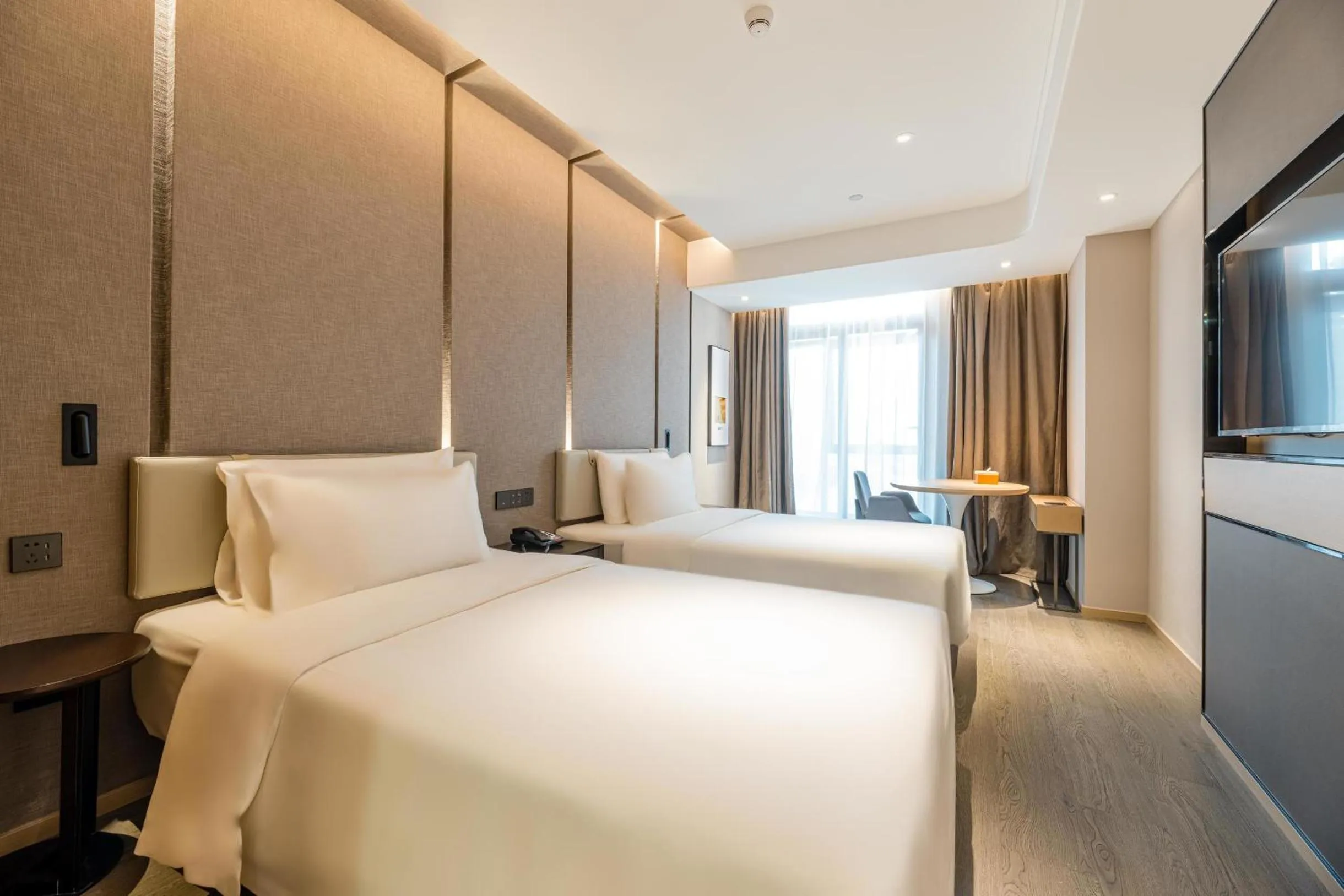 Bed in Atour Hotel Hangzhou Qianjiang Century City International Expo Center