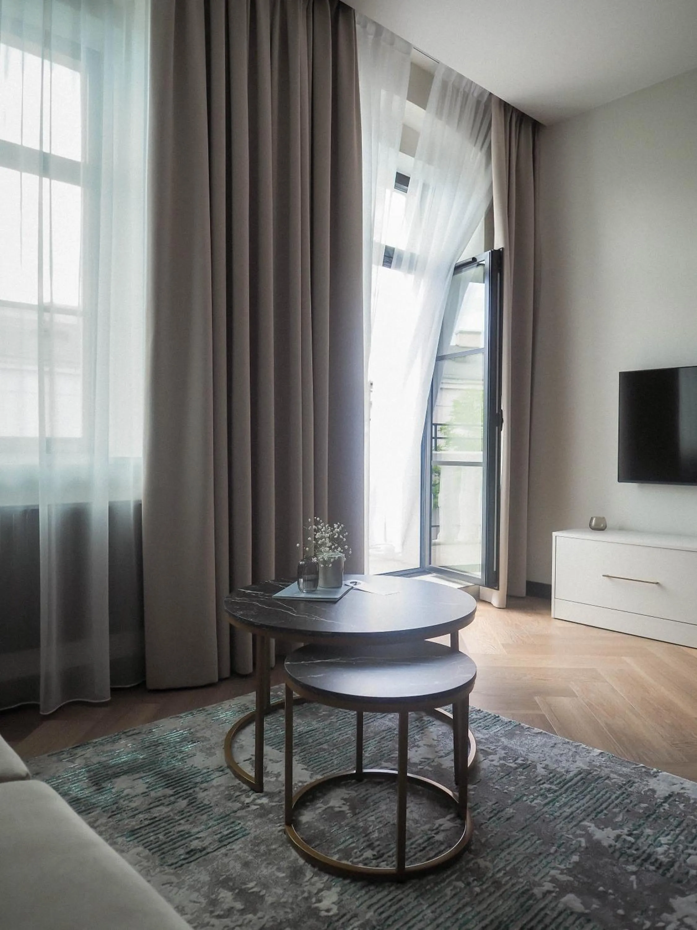 Communal lounge/ TV room in Carvala Boutique Apartments