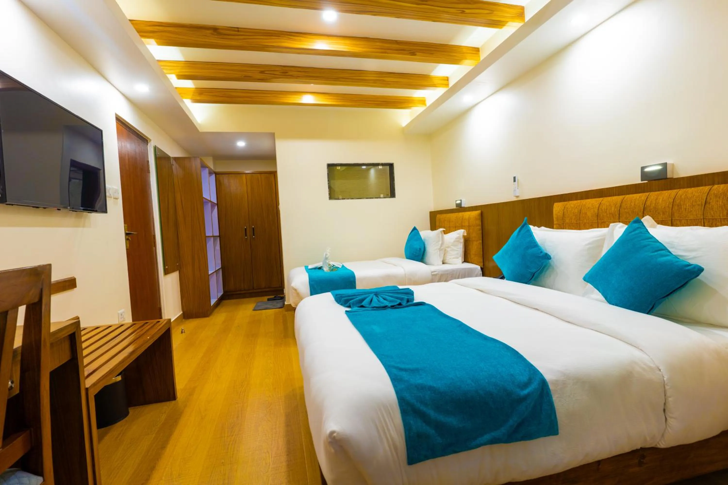 Bed in Pokhara Alpine and Springs