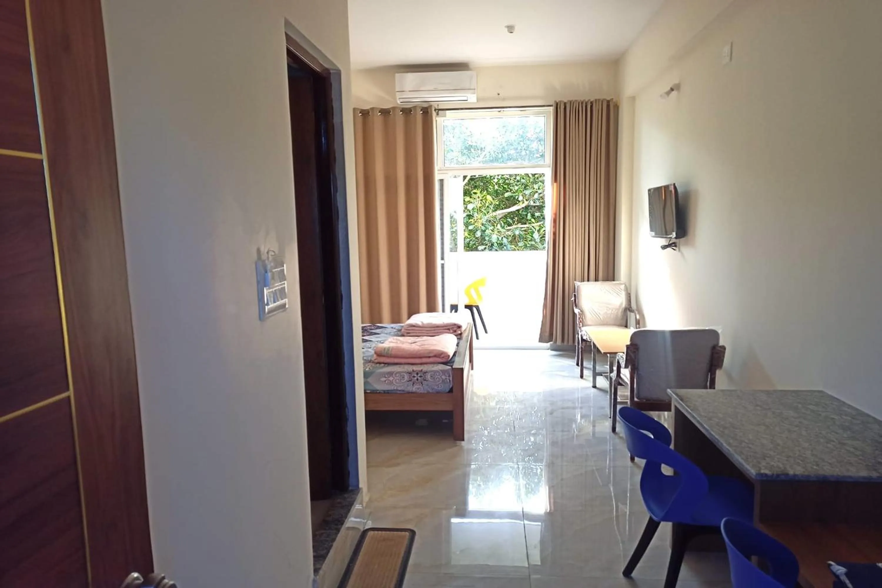 Bed in Dundi Mango Mist Resort