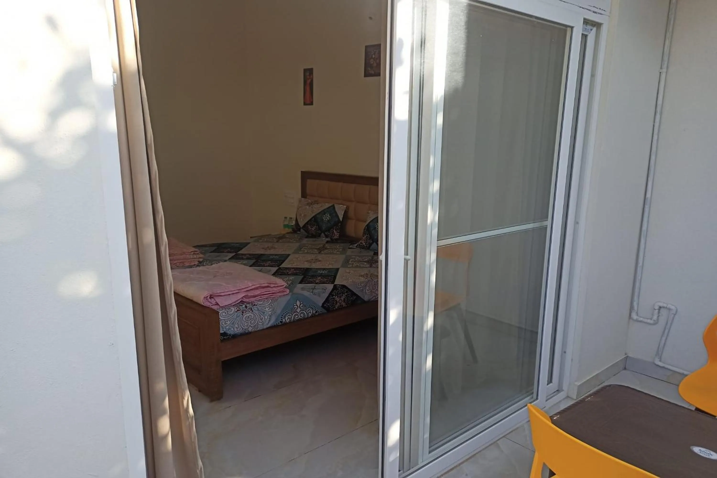 Bed in Dundi Mango Mist Resort