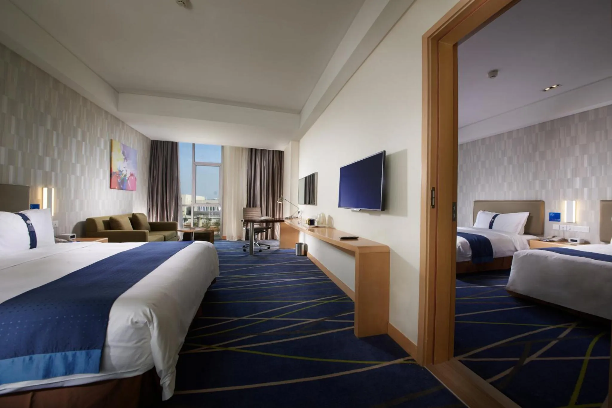 Photo of the whole room, Bed in Holiday Inn Express Zhengzhou Airport by IHG