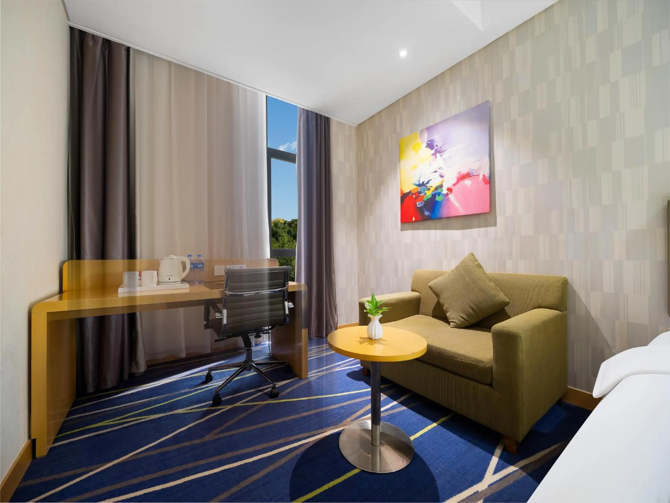 Seating area in Holiday Inn Express Zhengzhou Airport by IHG