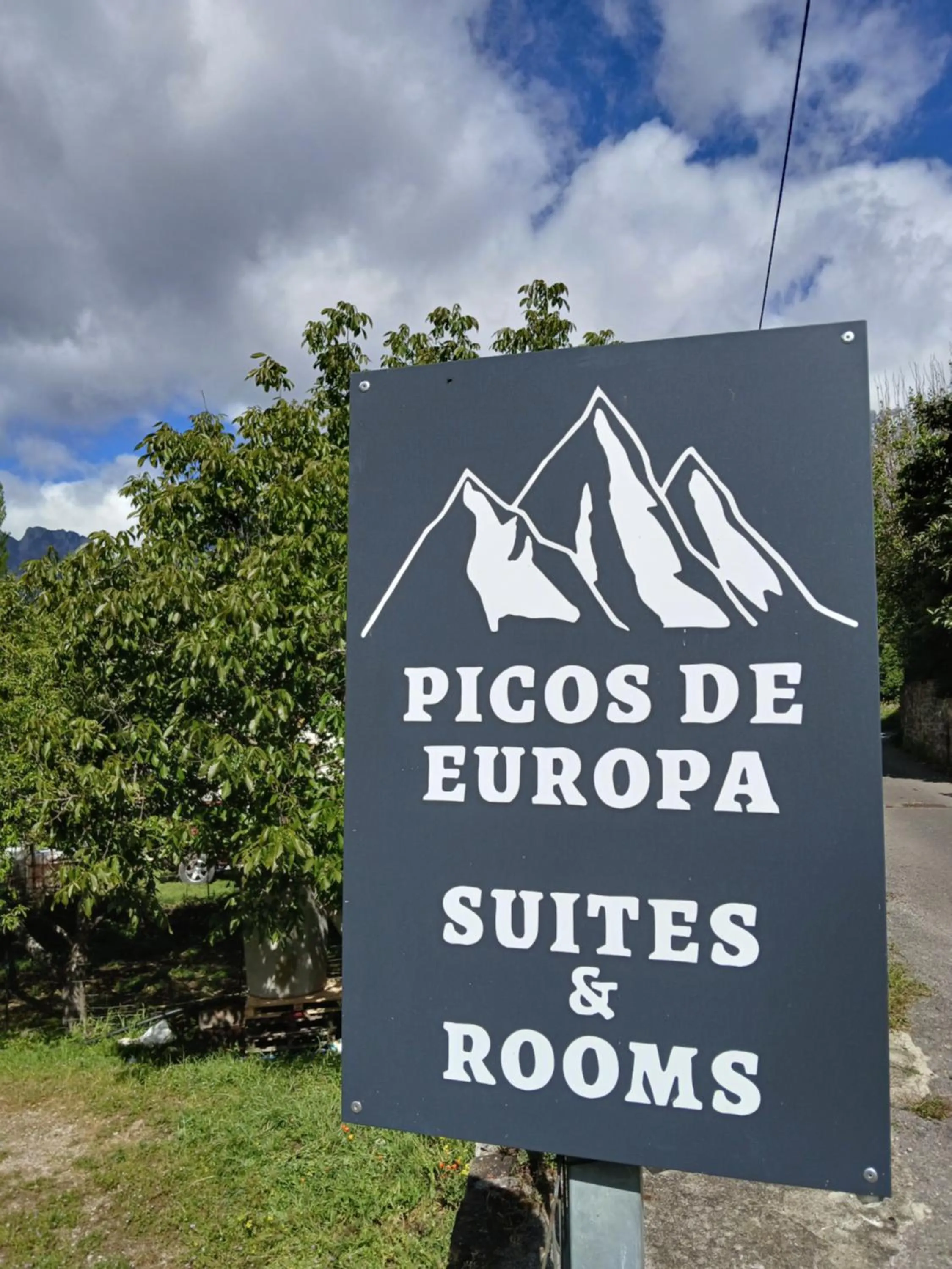 Property logo or sign in Picos de Europa Suites and Rooms